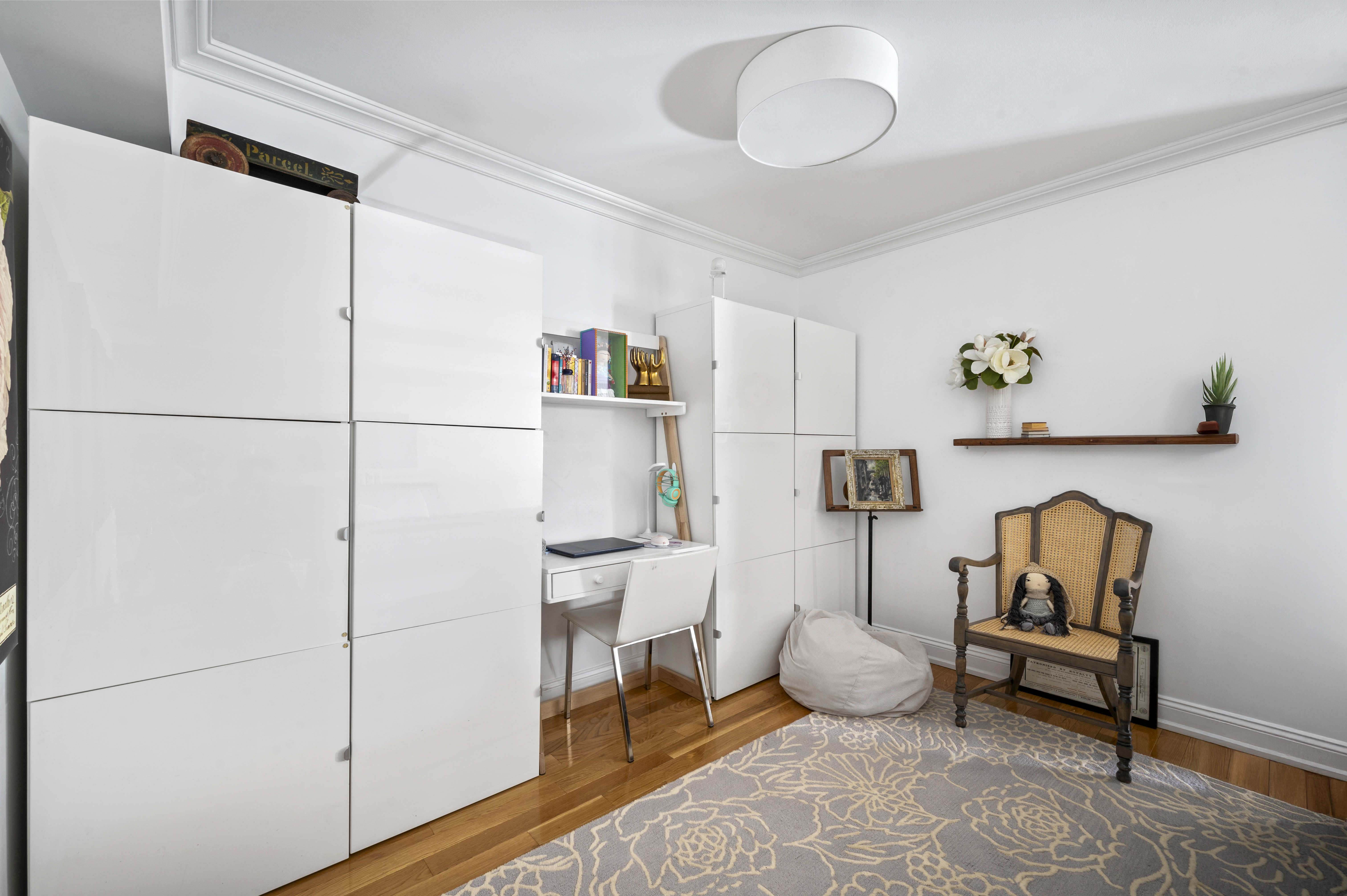 201 East 79th Street, Unit 6A Manhattan, NY 10075 - Photo 4 of 11 a living room with furniture
