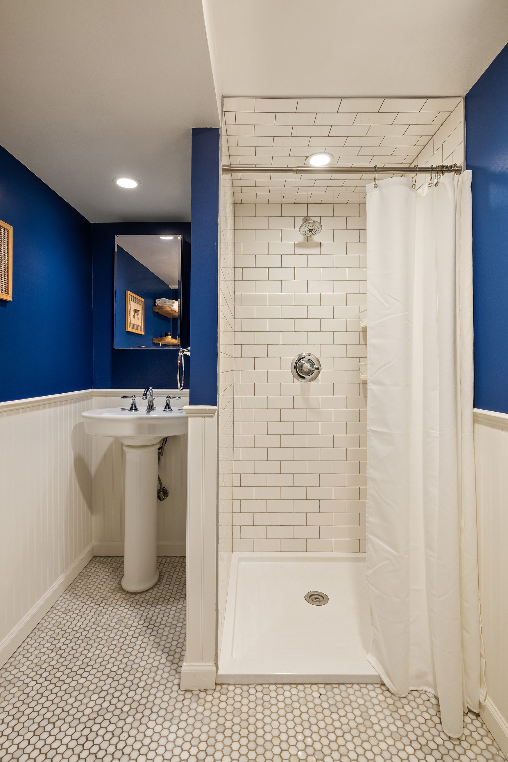 17-05 Willoughby Avenue Queens, NY 11385 - Photo 10 of 13 a bathroom with a sink a toilet and shower