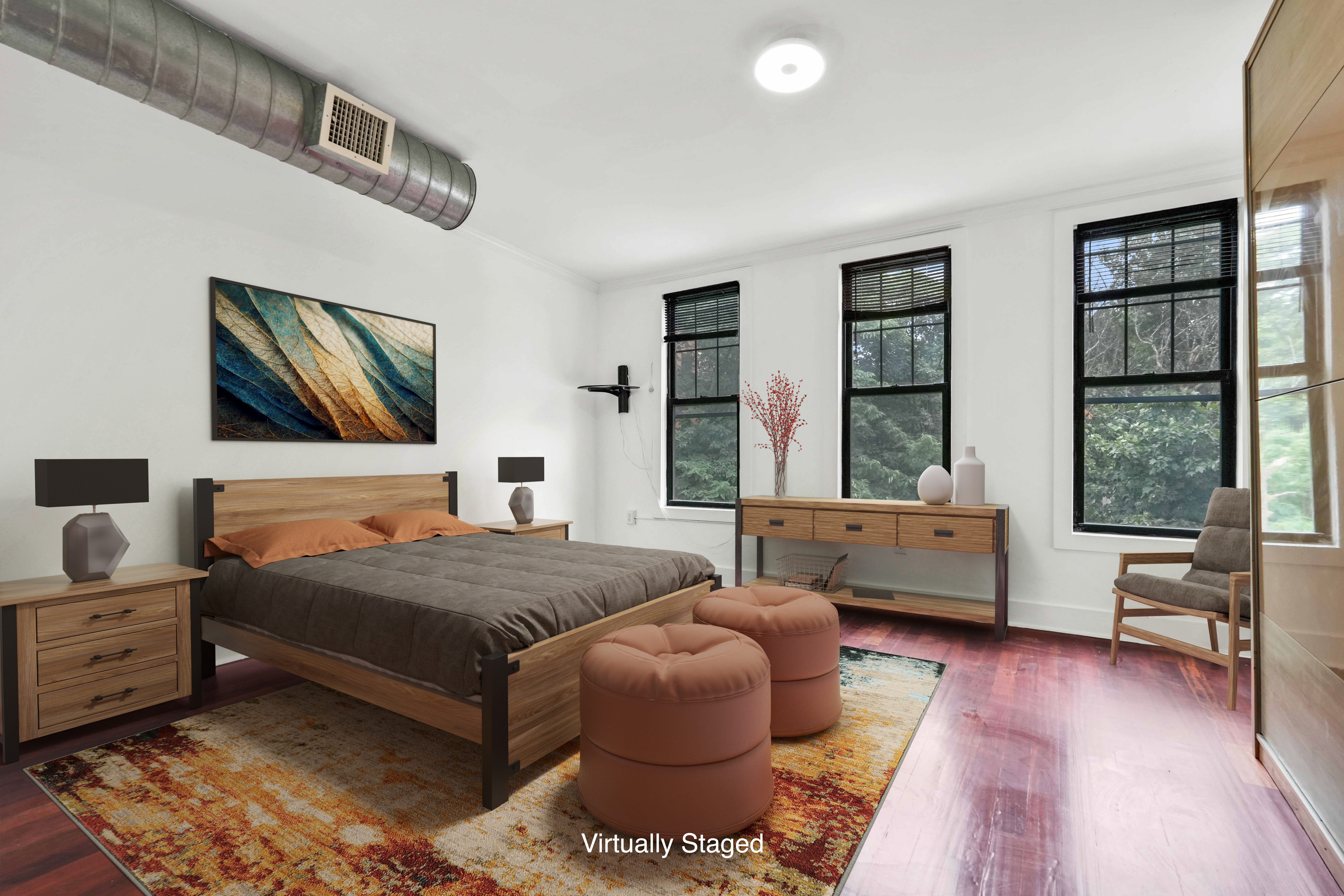 17 A Suydam Place, Unit 2 Brooklyn, NY 11233 - Photo 13 of 28 a bedroom with a large bed and windows
