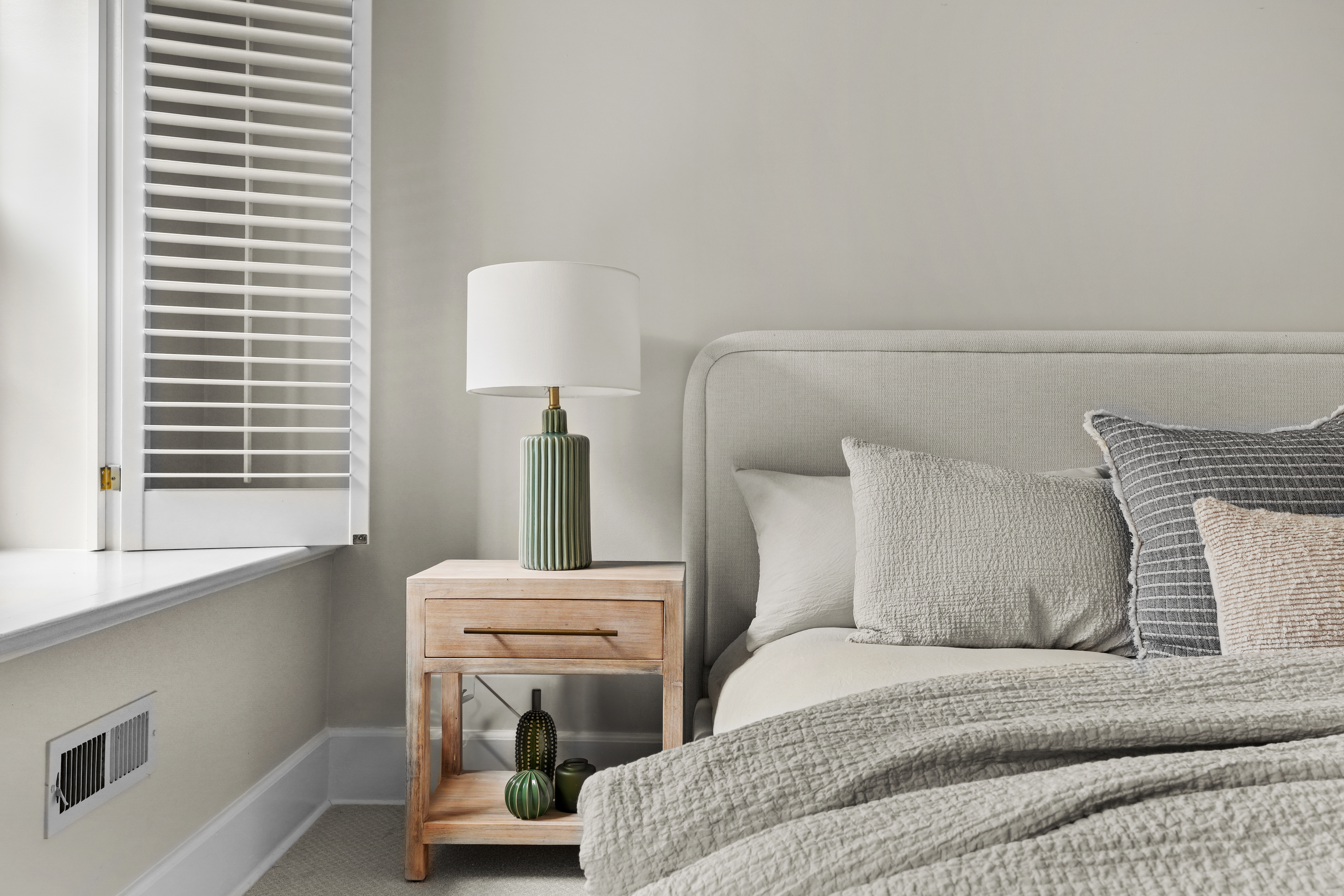 247 East 71st Street Manhattan, NY 10021 - Photo 22 of 31 a bedroom with a bed and a window