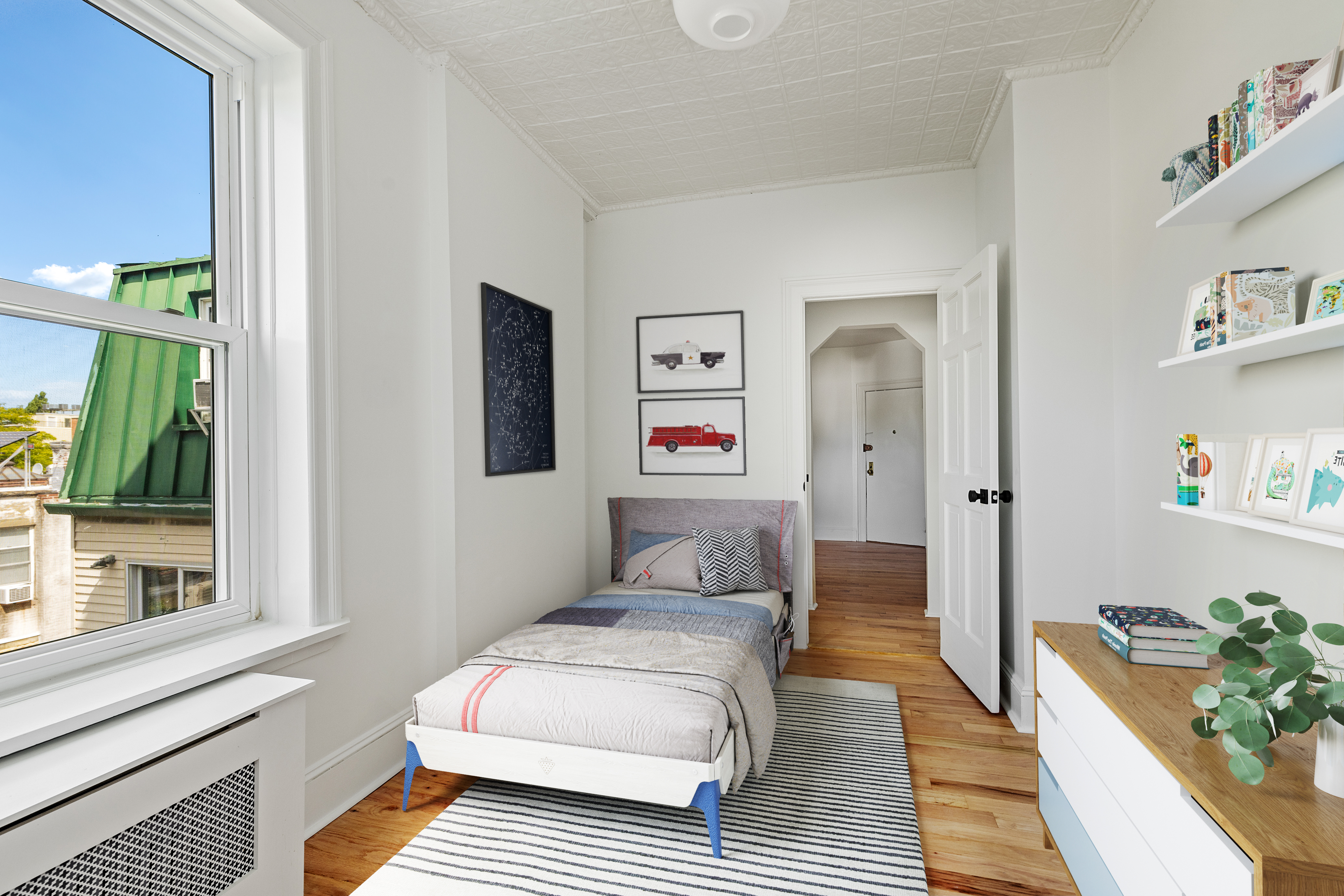 456 Prospect Avenue, Unit 3R Brooklyn, NY 11215 - Photo 13 of 16 a bedroom with a bed and a large window