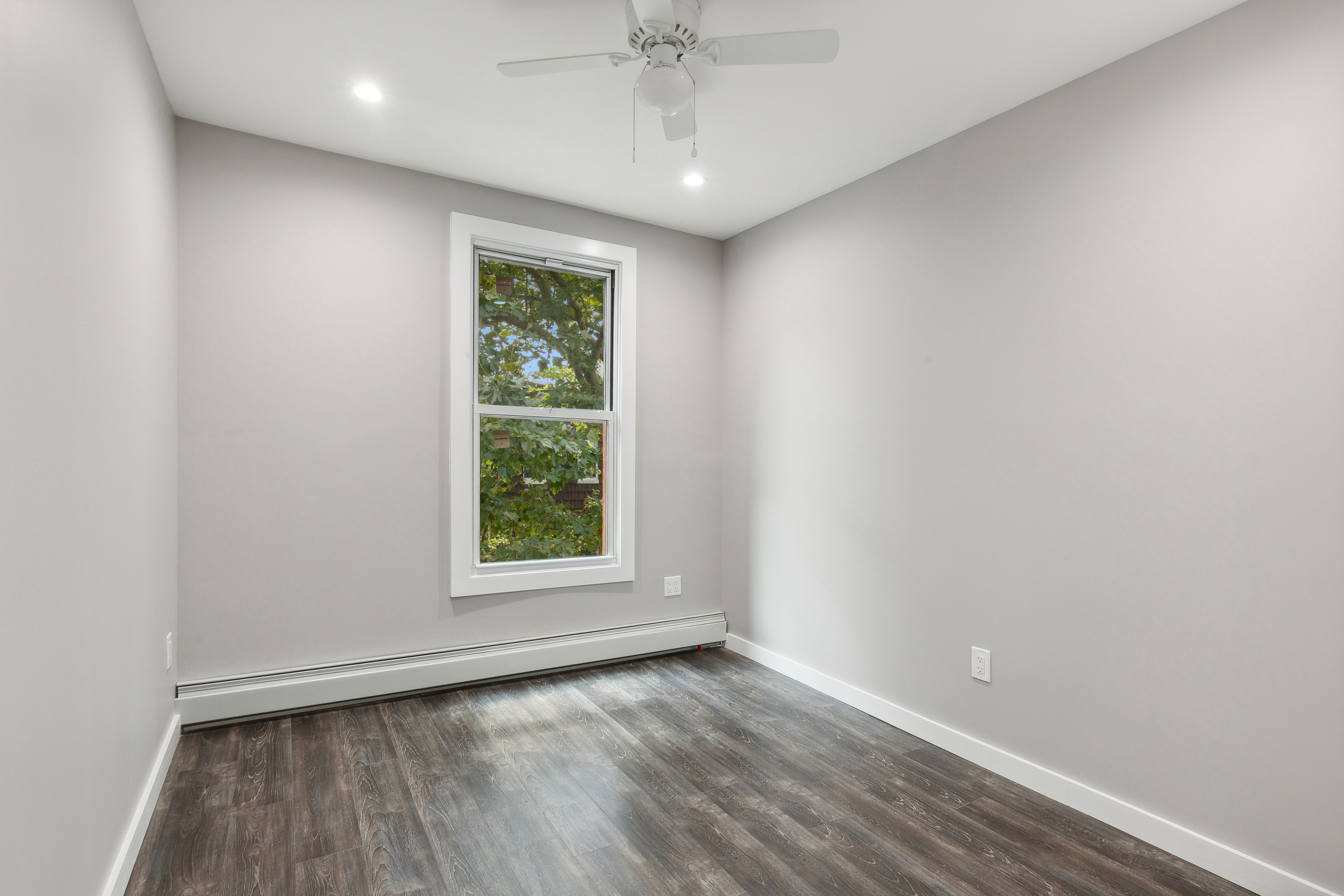 63 Devoe Street, Unit 3 Brooklyn, NY 11211 - Photo 5 of 7 an empty room with a window