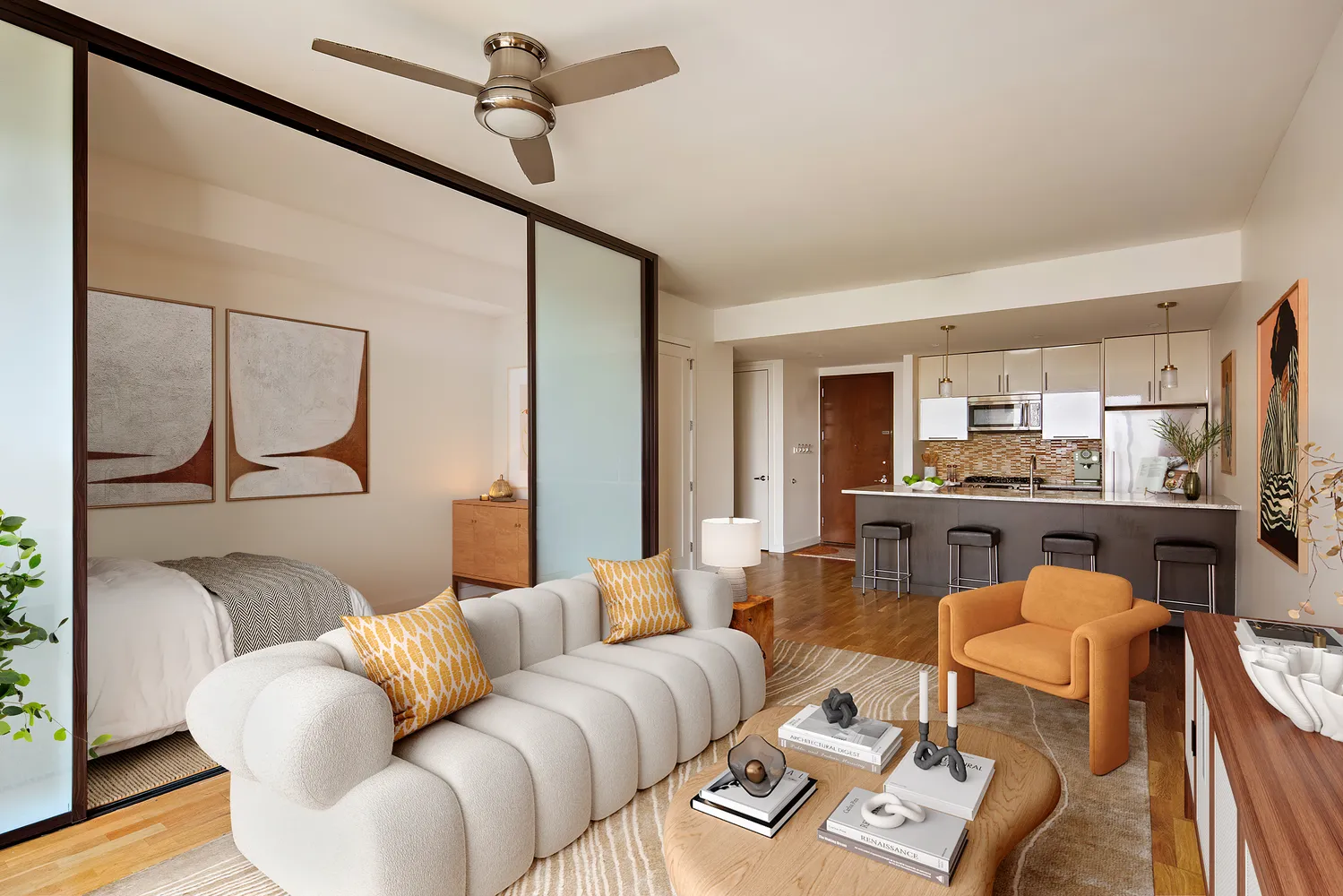 a living room with furniture and a view of kitchen