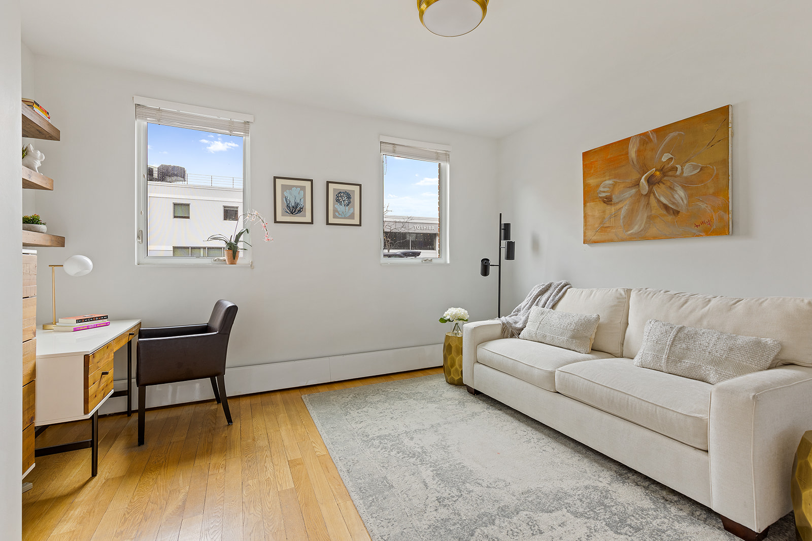 115 3rd Street, Unit 1 Brooklyn, NY 11231 - Photo 7 of 13 a living room with furniture and a wooden floor