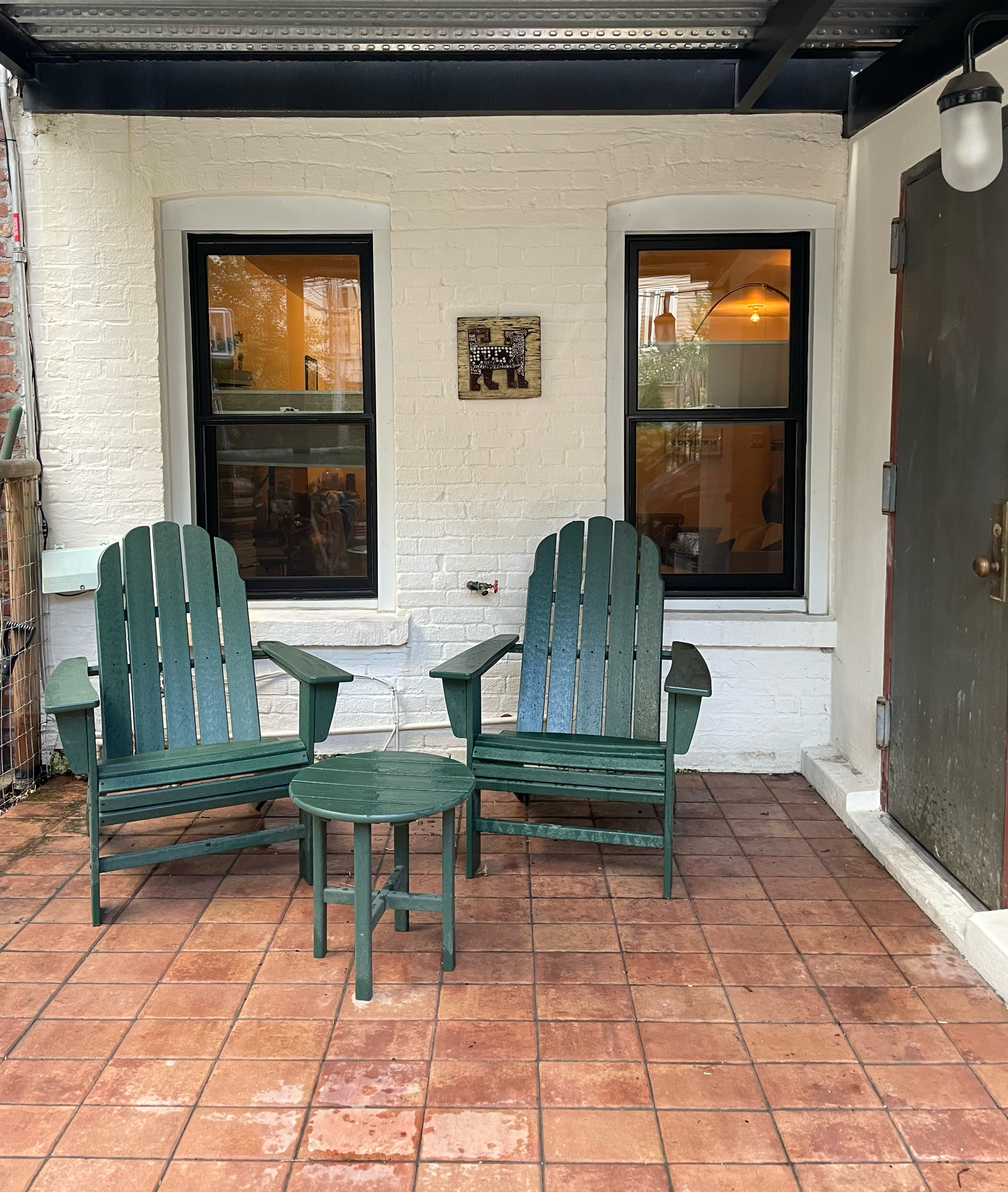 1370 Pacific Street, Unit 1 Brooklyn, NY 11216 - Photo 6 of 9 a porch with a bench and a potted plant