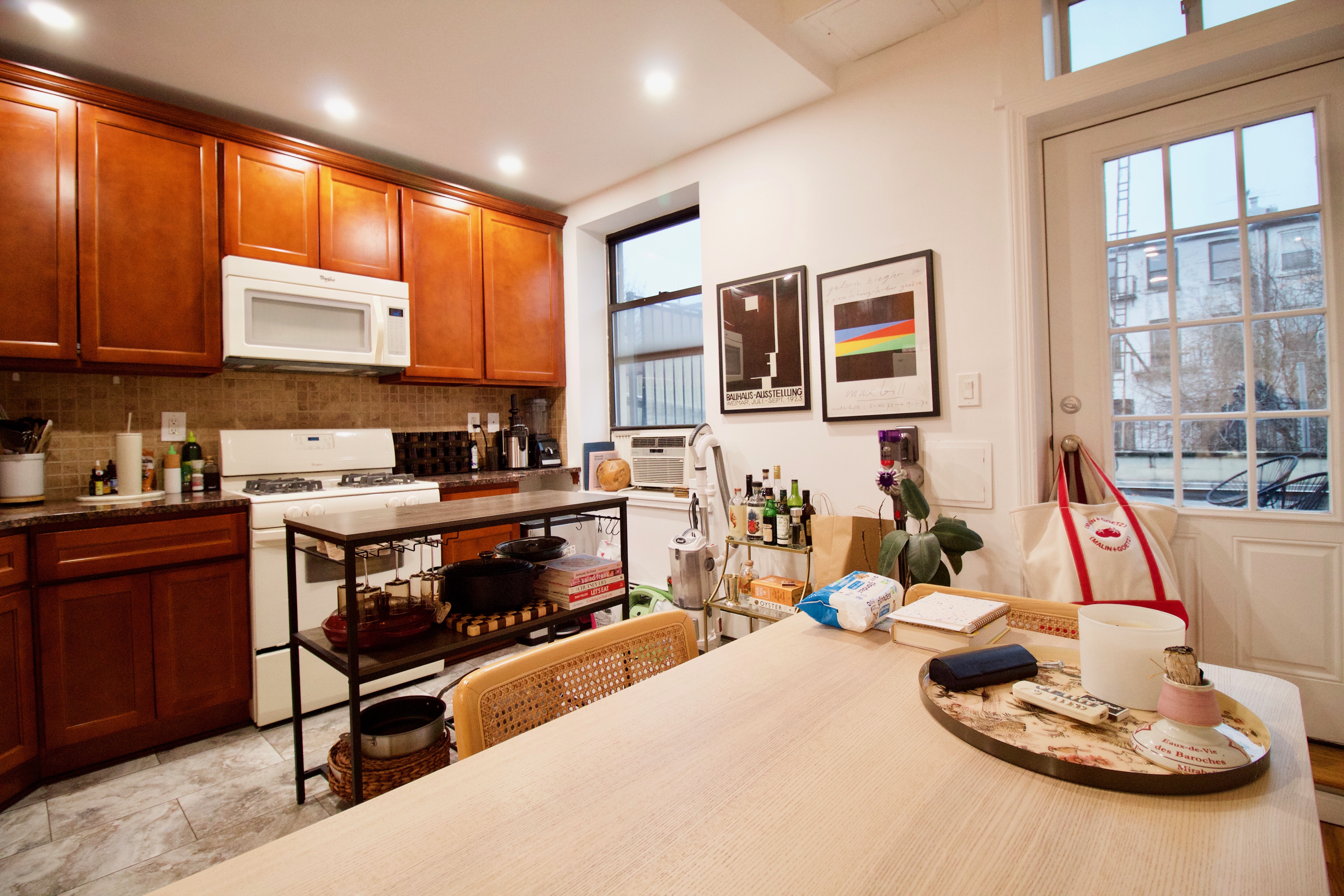 134 Union Street, Unit 2R Brooklyn, NY 11231 - Photo 6 of 37 a living room with furniture kitchen and a large window