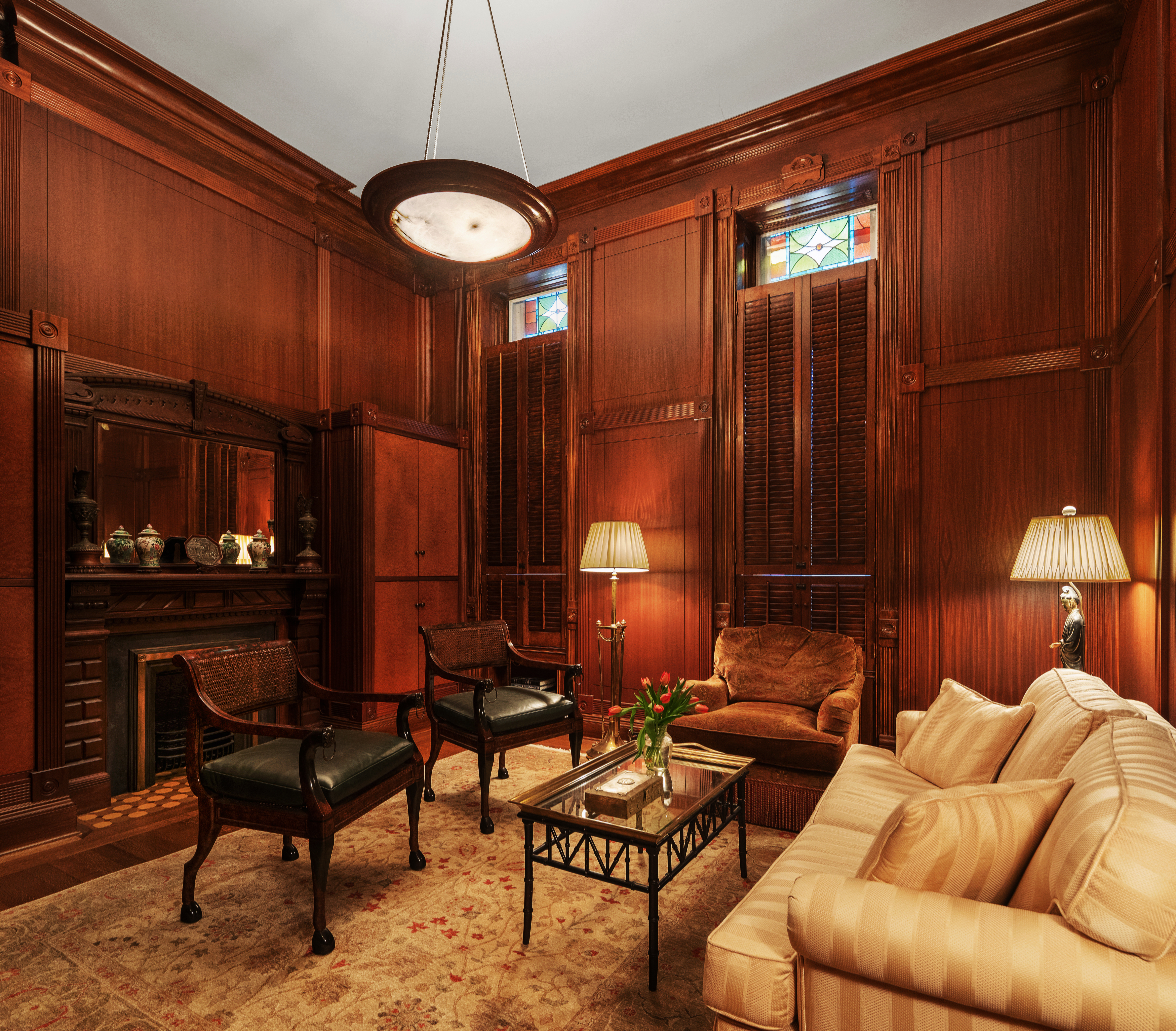 34 Gramercy Park East, Unit MAF Manhattan, NY 10010 - Photo 9 of 17 a living room with furniture a lamp and a large window