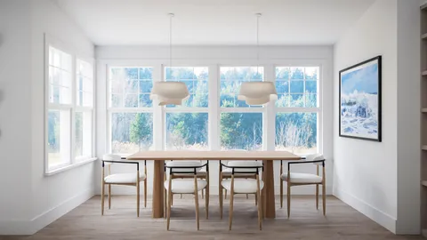a dining room with wooden floor and windows