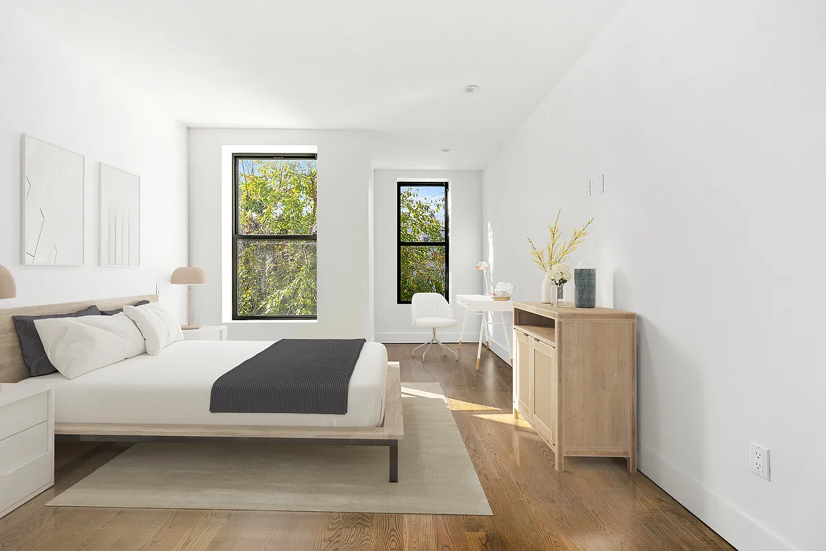 340 14th Street, Unit 2L Brooklyn, NY 11215 - Photo 4 of 9 a bedroom with a bed and a large window