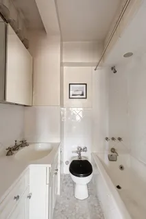 a bathroom with a sink and a bathtub