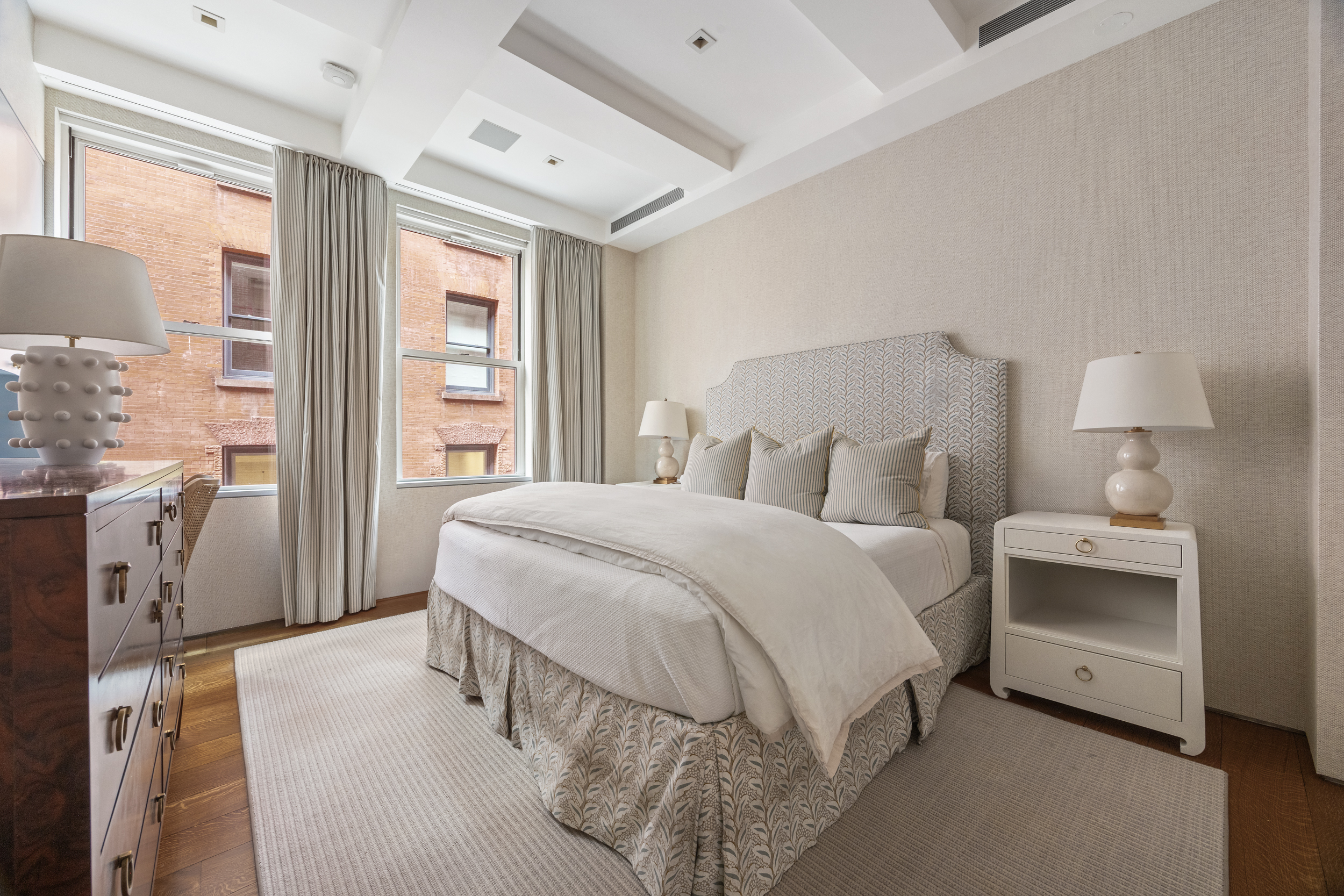 5 Harrison Street, Unit 3 Manhattan, NY 10013 - Photo 8 of 14 a spacious bedroom with a bed and a window