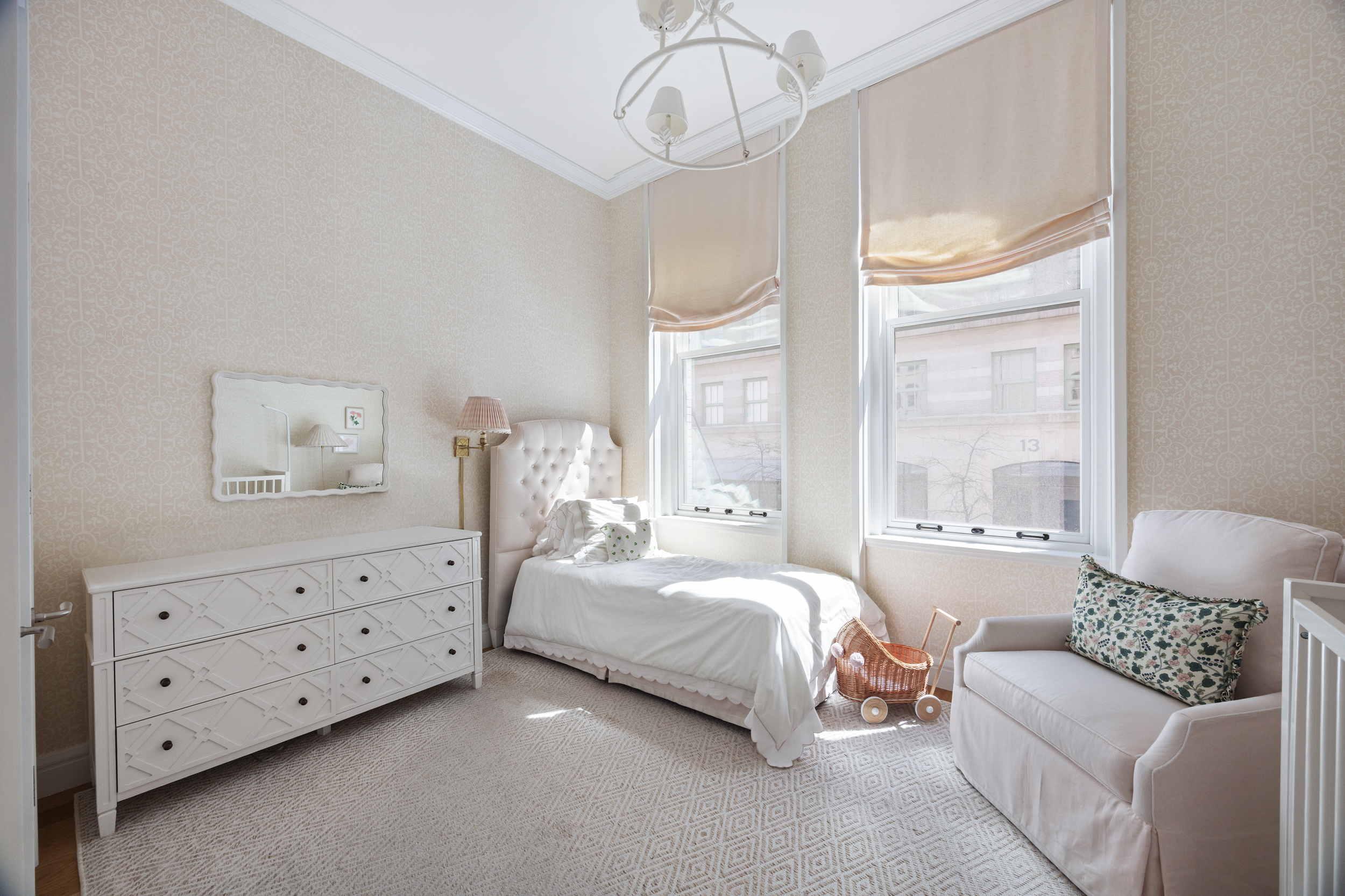 71 Laight Street, Unit 2F Manhattan, NY 10013 - Photo 10 of 20 a spacious bedroom with a bed a couch and large window