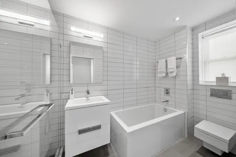 a bathroom with a sink and a bathtub