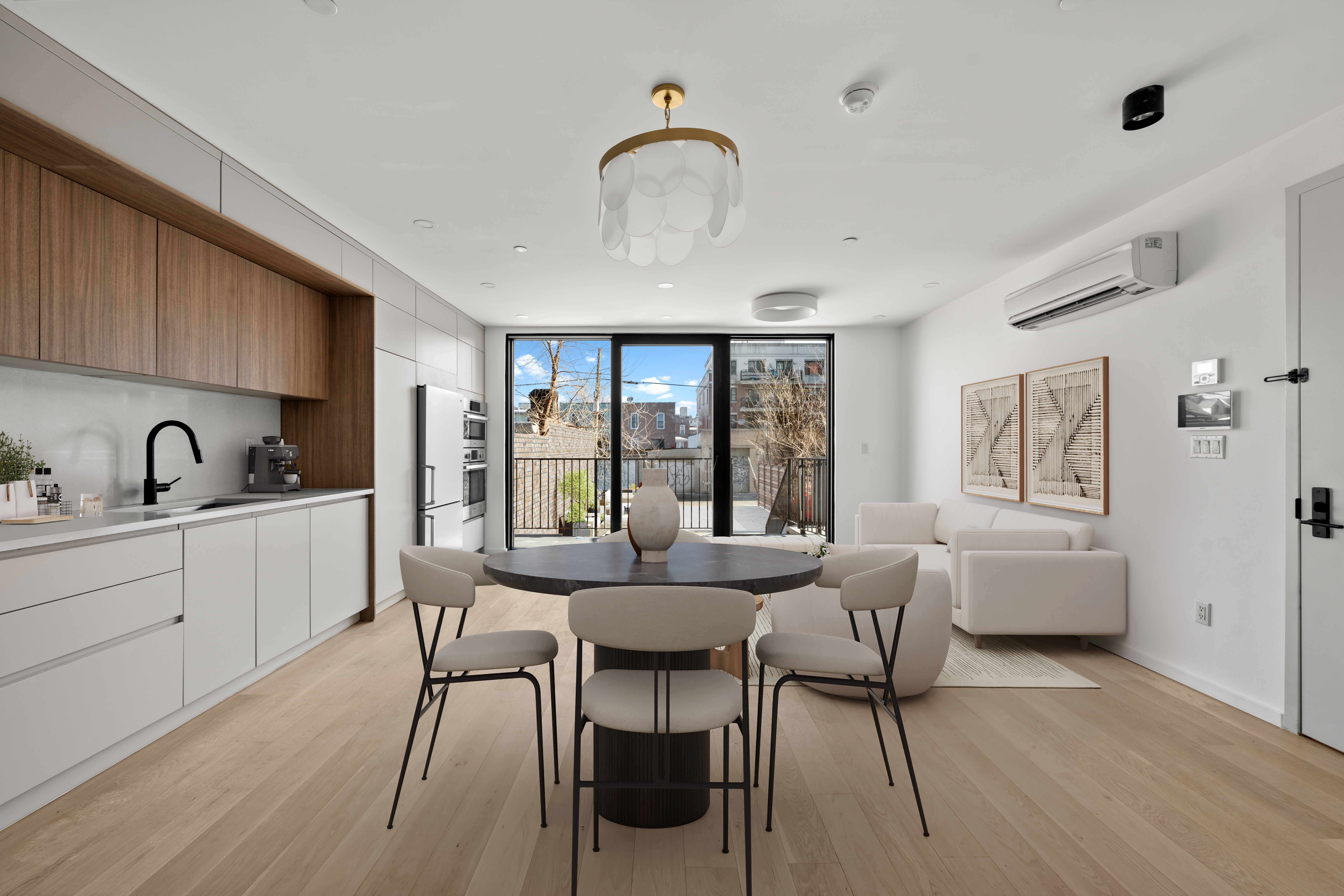14-35 Broadway, Unit 1A Queens, NY 11106 - Photo 6 of 20 a view of a dining room with furniture window and wooden floor