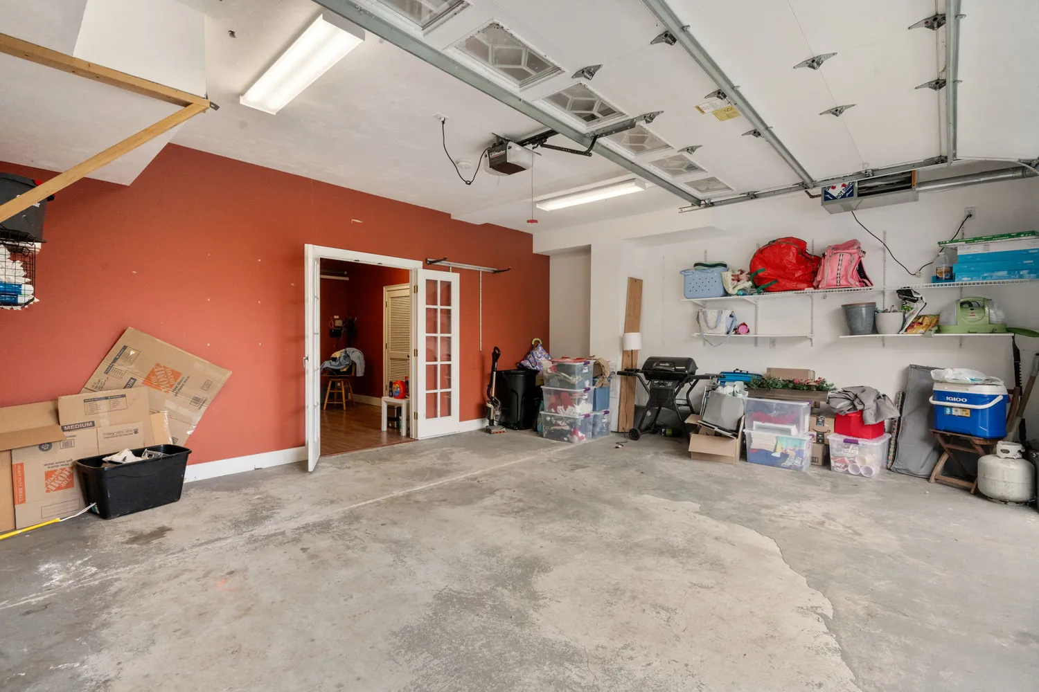 a view of a garage with storage