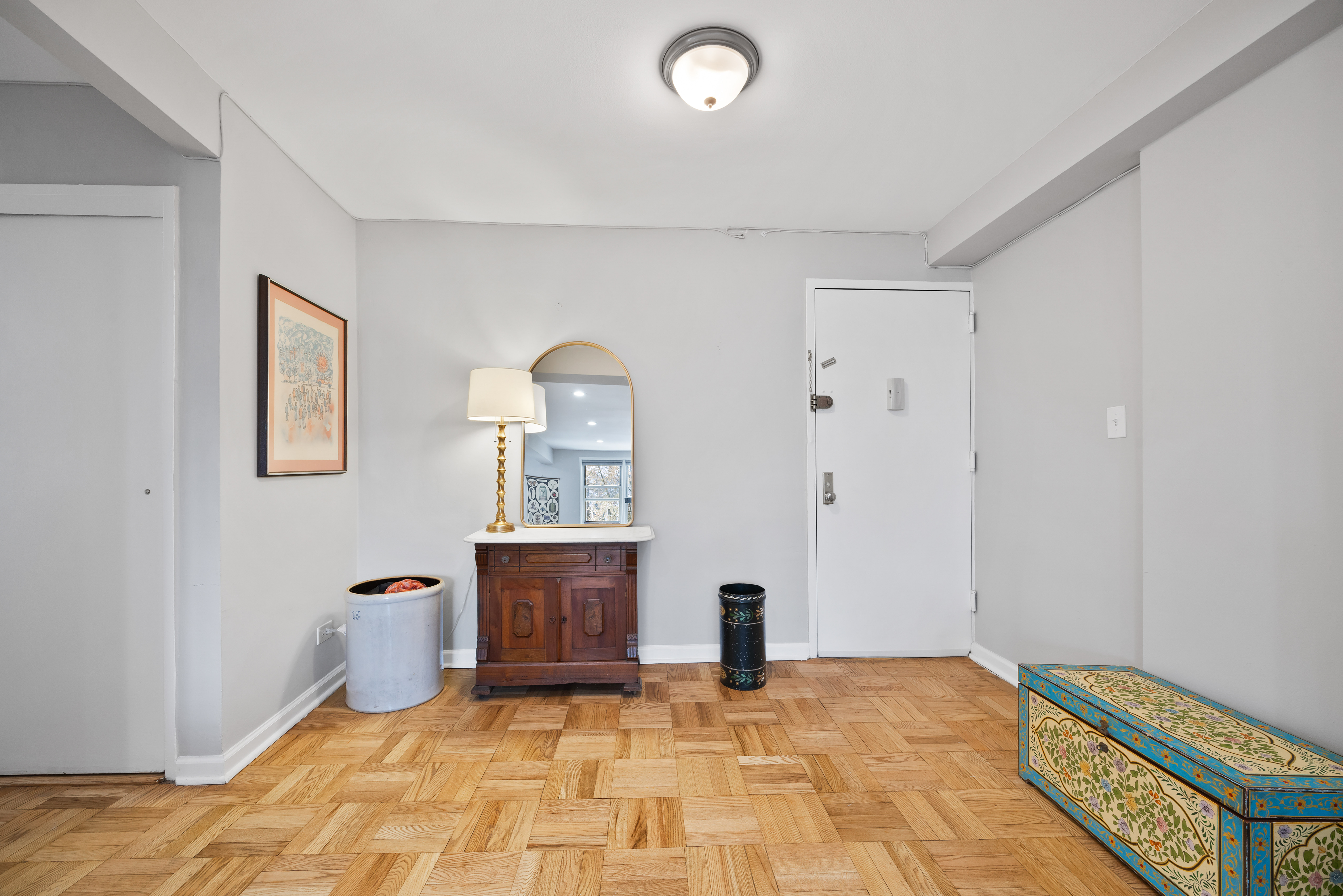255 Fieldston Terrace, Unit 2L Bronx, NY 10471 - Photo 8 of 32 a view of livingroom with furniture and window
