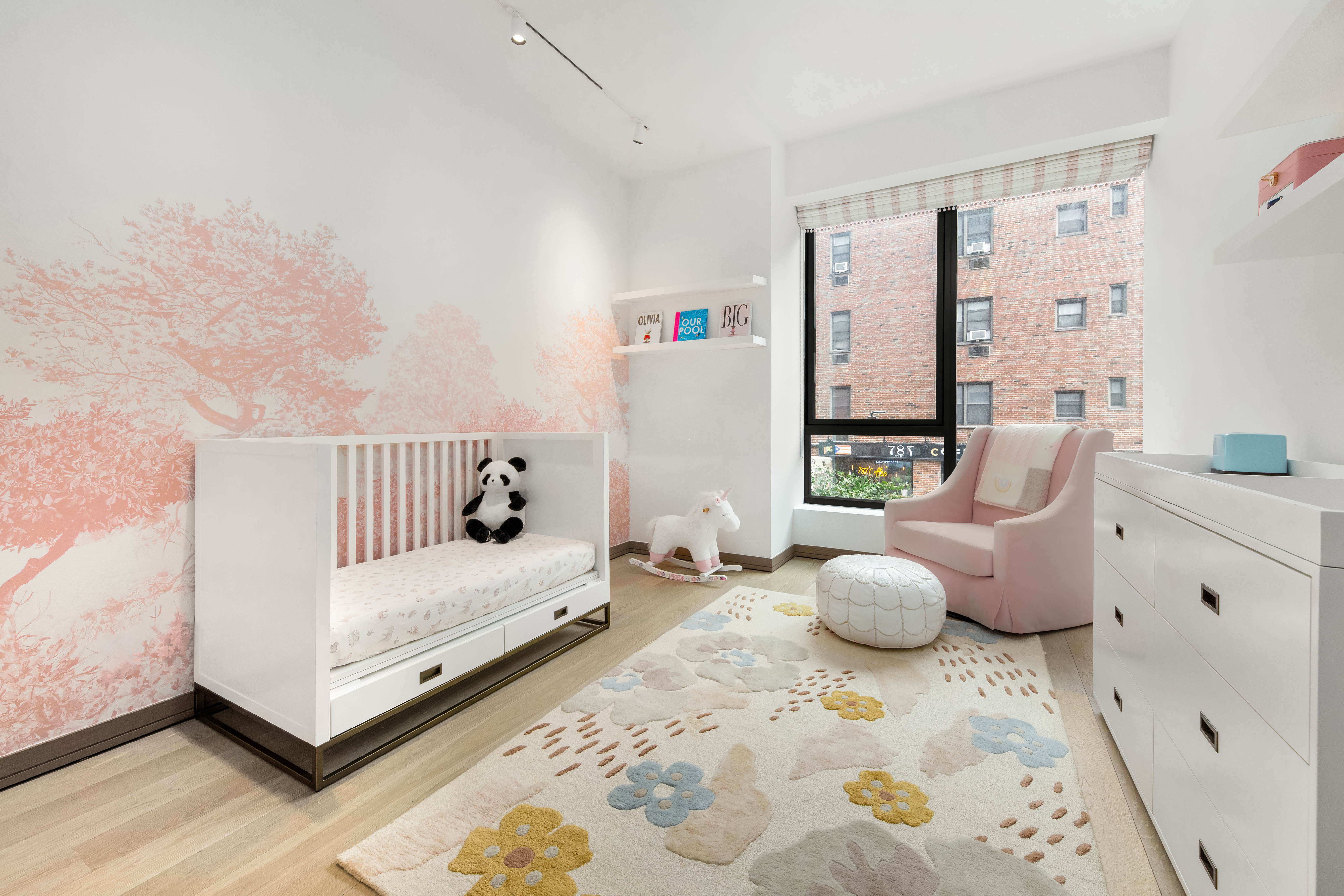 90 Lexington Avenue, Unit MC Manhattan, NY 10016 - Photo 11 of 26 a bedroom with furniture and a large window