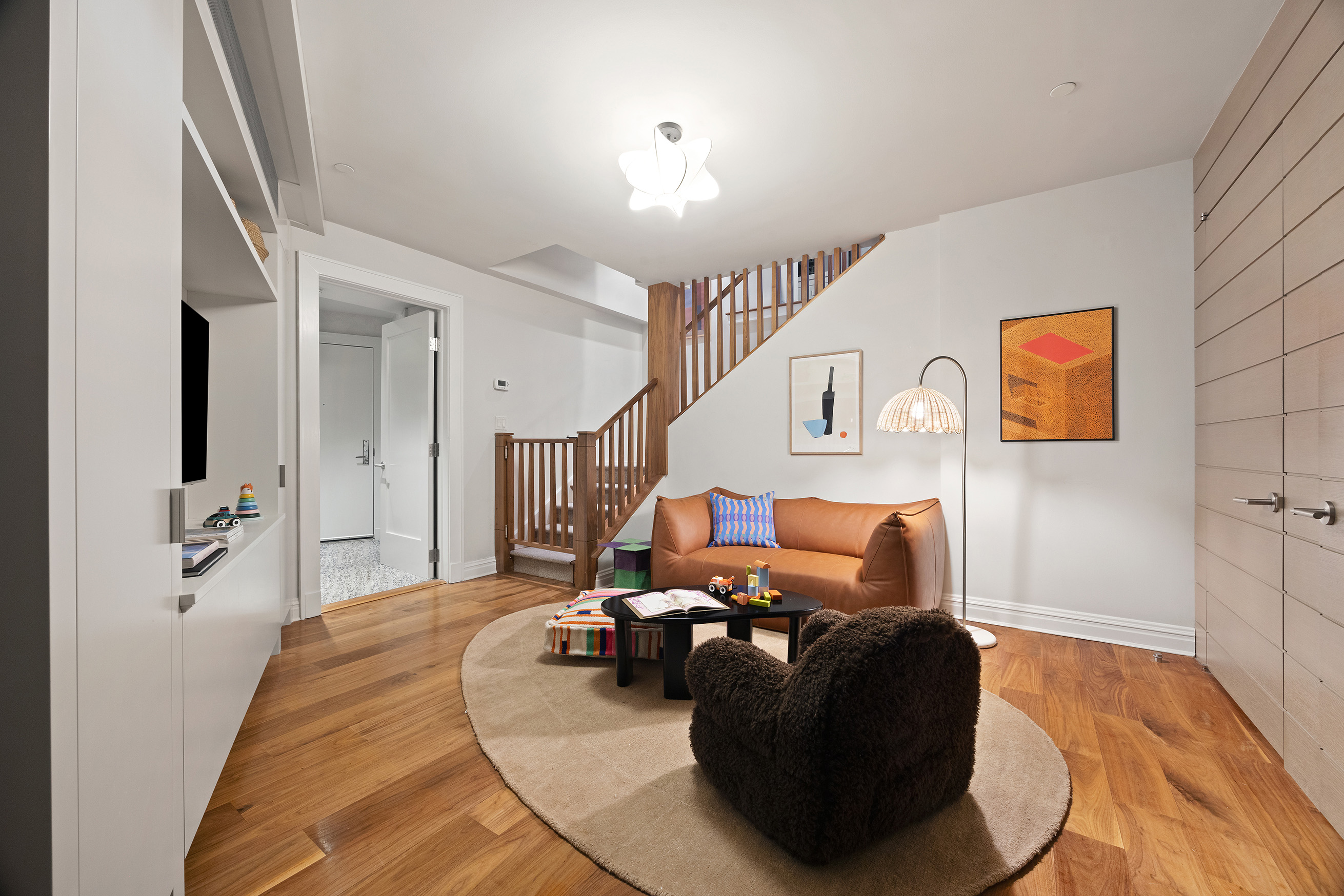 161 Duane Street, Unit 4B Manhattan, NY 10013 - Photo 12 of 16 a living room with furniture