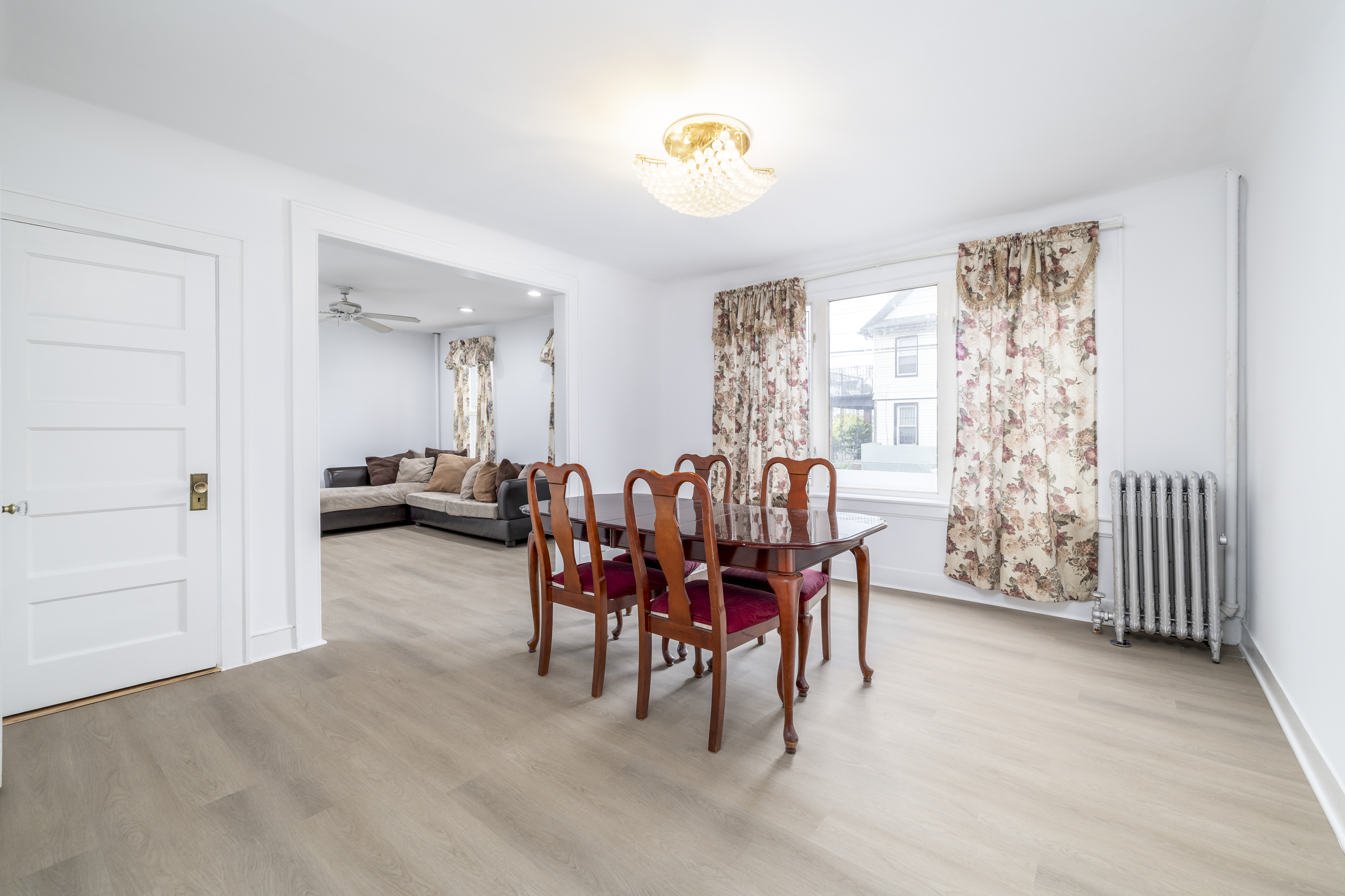 87-46 89th Street Queens, NY 11421 - Photo 6 of 25 a view of a livingroom with furniture and window