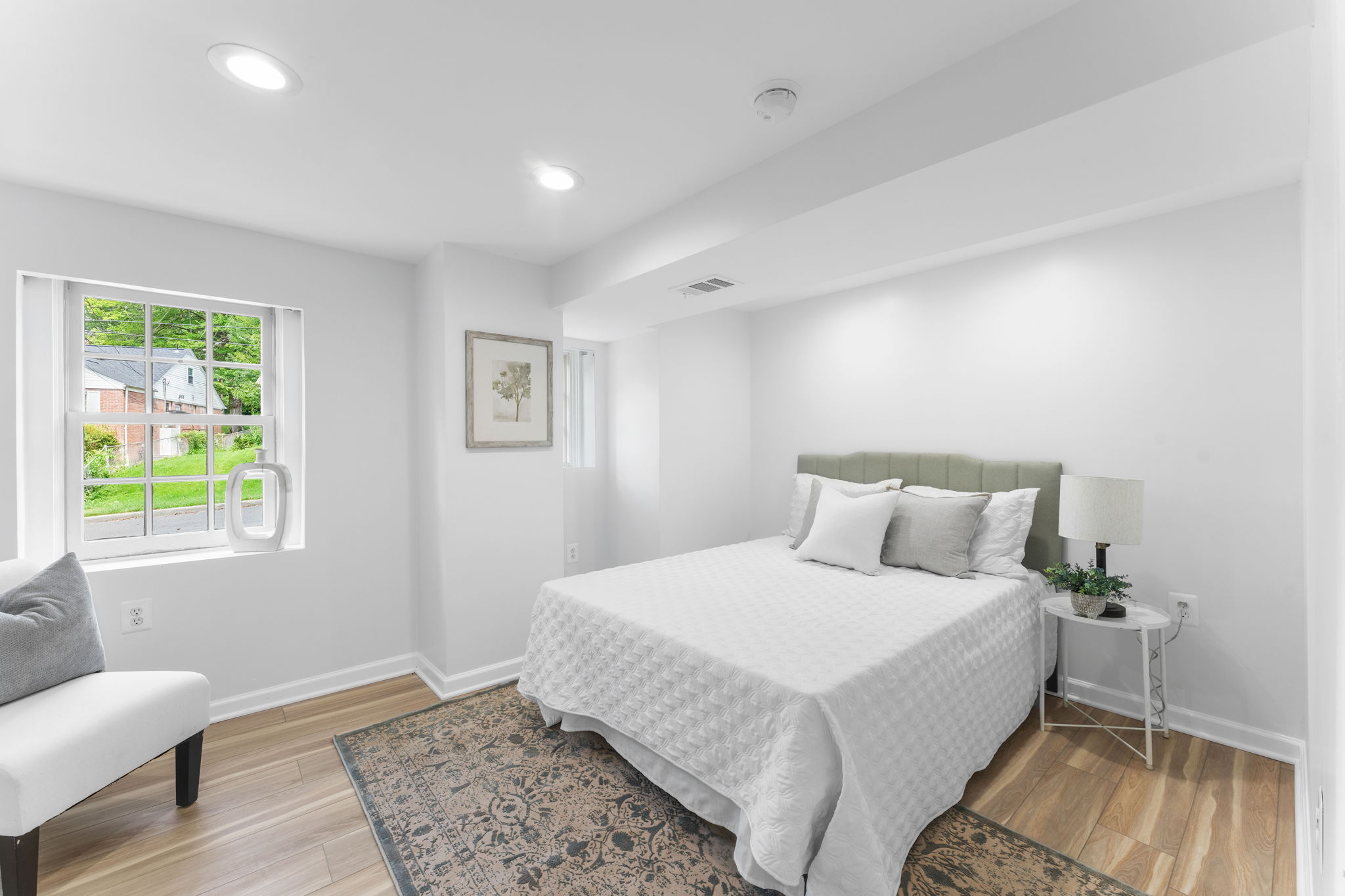 1325 Locust Road Northwest Washington, DC 20012 - Photo 45 of 56 a bedroom with a bed and a window