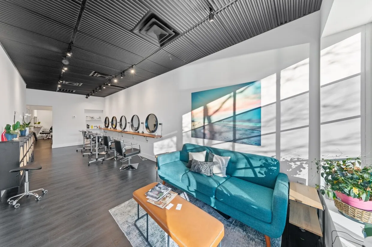 a very nice looking room with lots of furniture and a chandelier