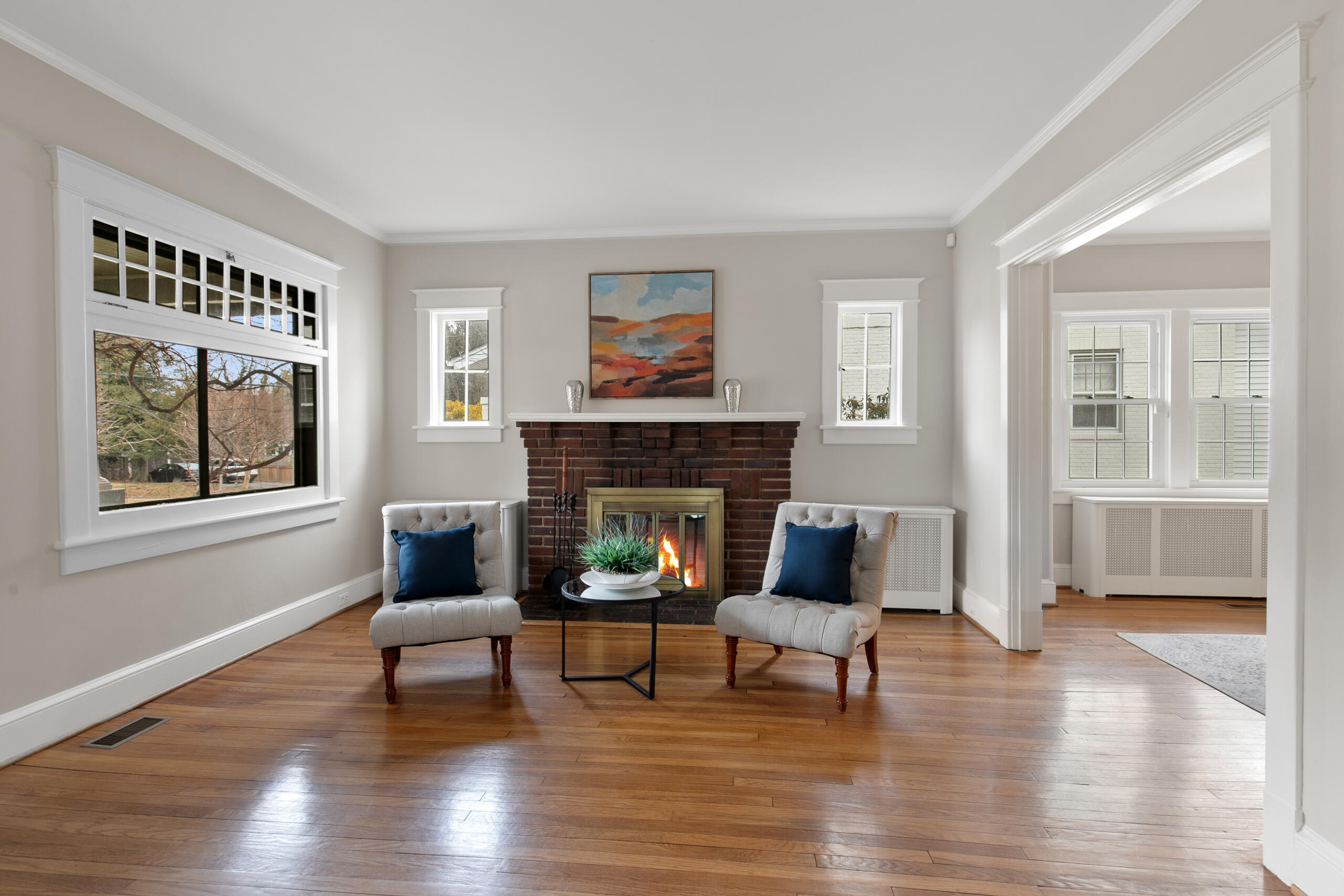 1908 Glen Ross Road Silver Spring, MD 20910 - Photo 9 of 63 a living room with furniture and a fireplace
