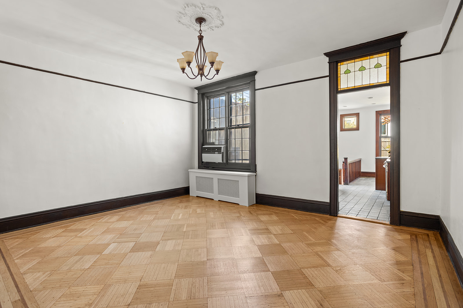 26 Fuller Place Brooklyn, NY 11215 - Photo 5 of 14 a view of an empty room with a window