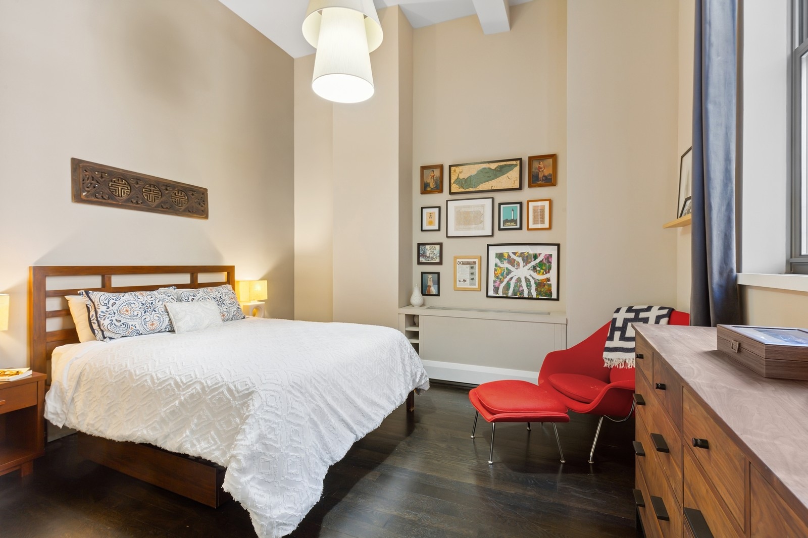 263 9th Avenue, Unit 3D Manhattan, NY 10001 - Photo 7 of 15 a bedroom with a bed and wooden floor