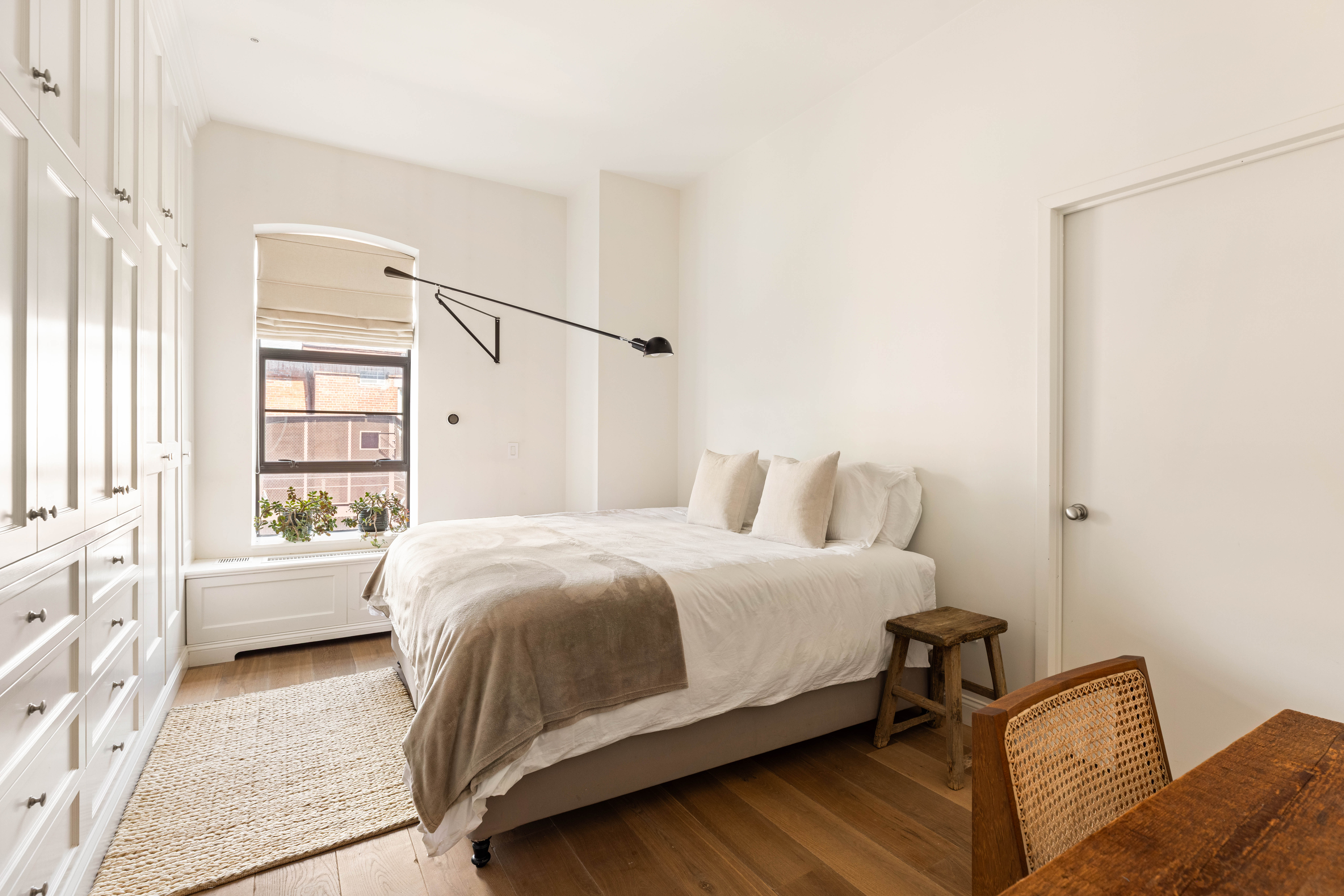 20 Henry Street, Unit 5D/S Brooklyn, NY 11201 - Photo 10 of 15 a bedroom with a bed and a window