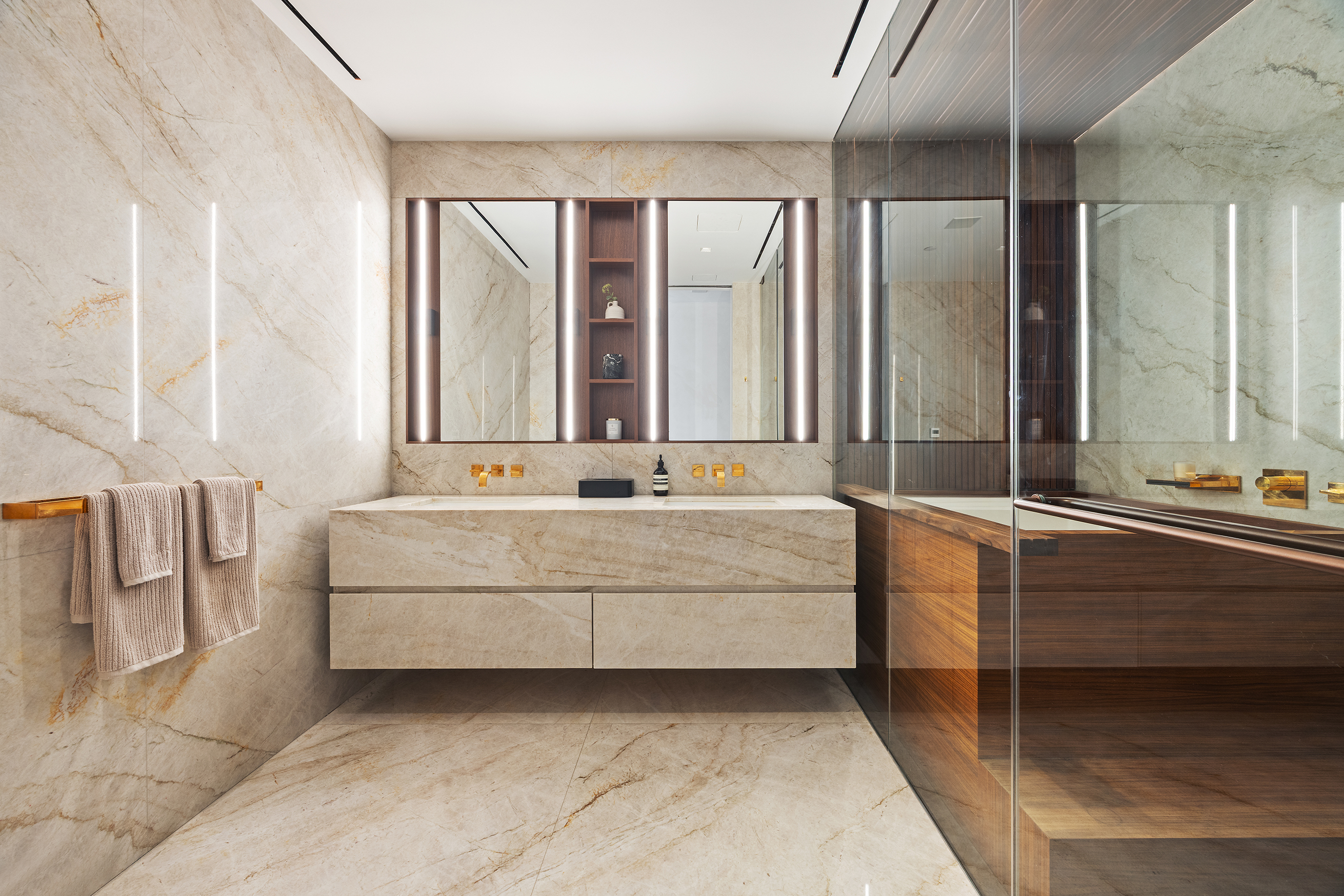 1 Great Jones Alley, Unit 10 Manhattan, NY 10012 - Photo 23 of 41 a bathroom with a tub sink and mirror