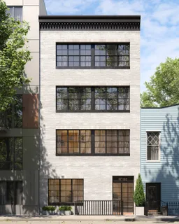 a front view of a building with glass windows