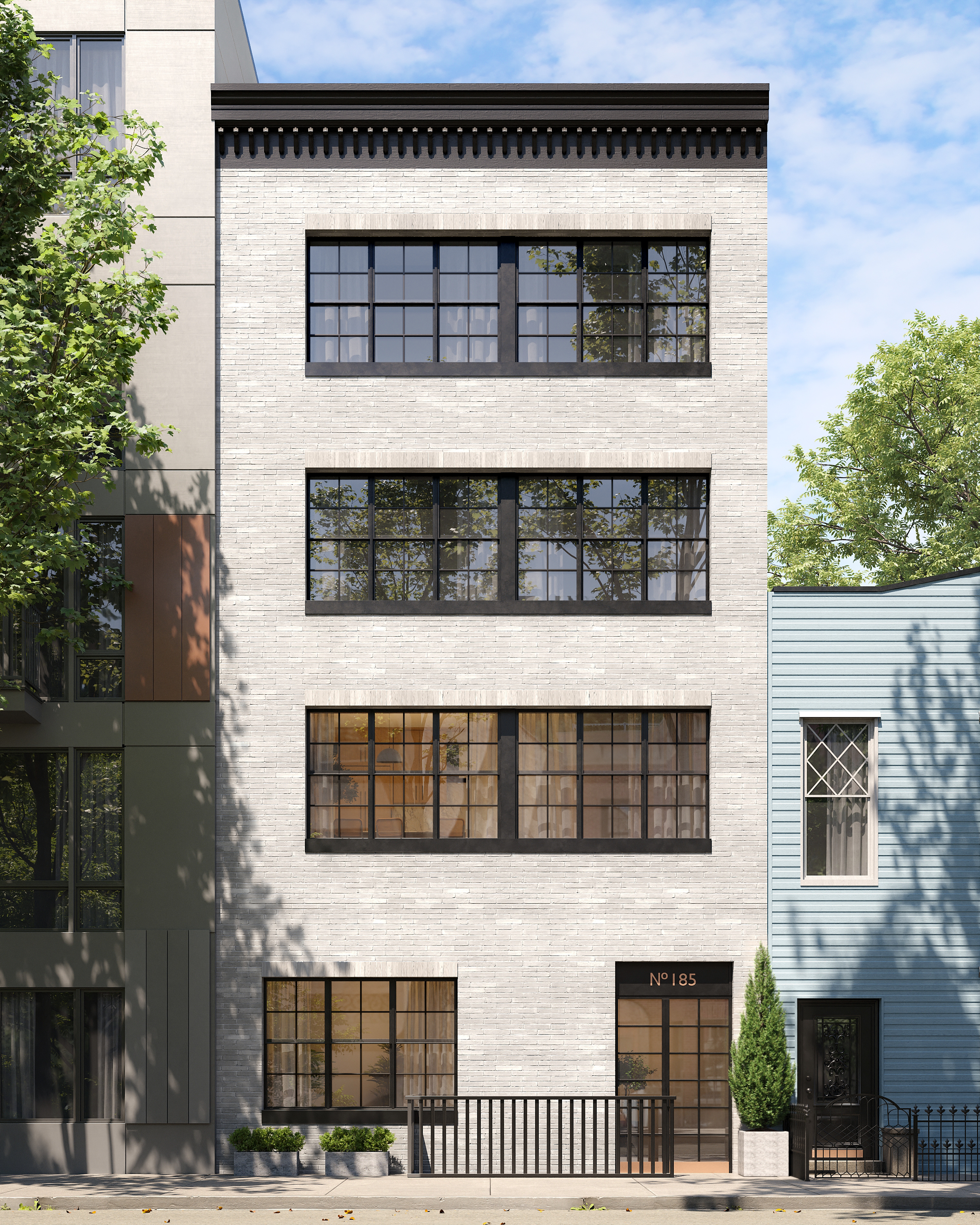 185 Ainslie Street, Unit 3 Brooklyn, NY 11211 - Photo 11 of 12 a front view of a building with glass windows