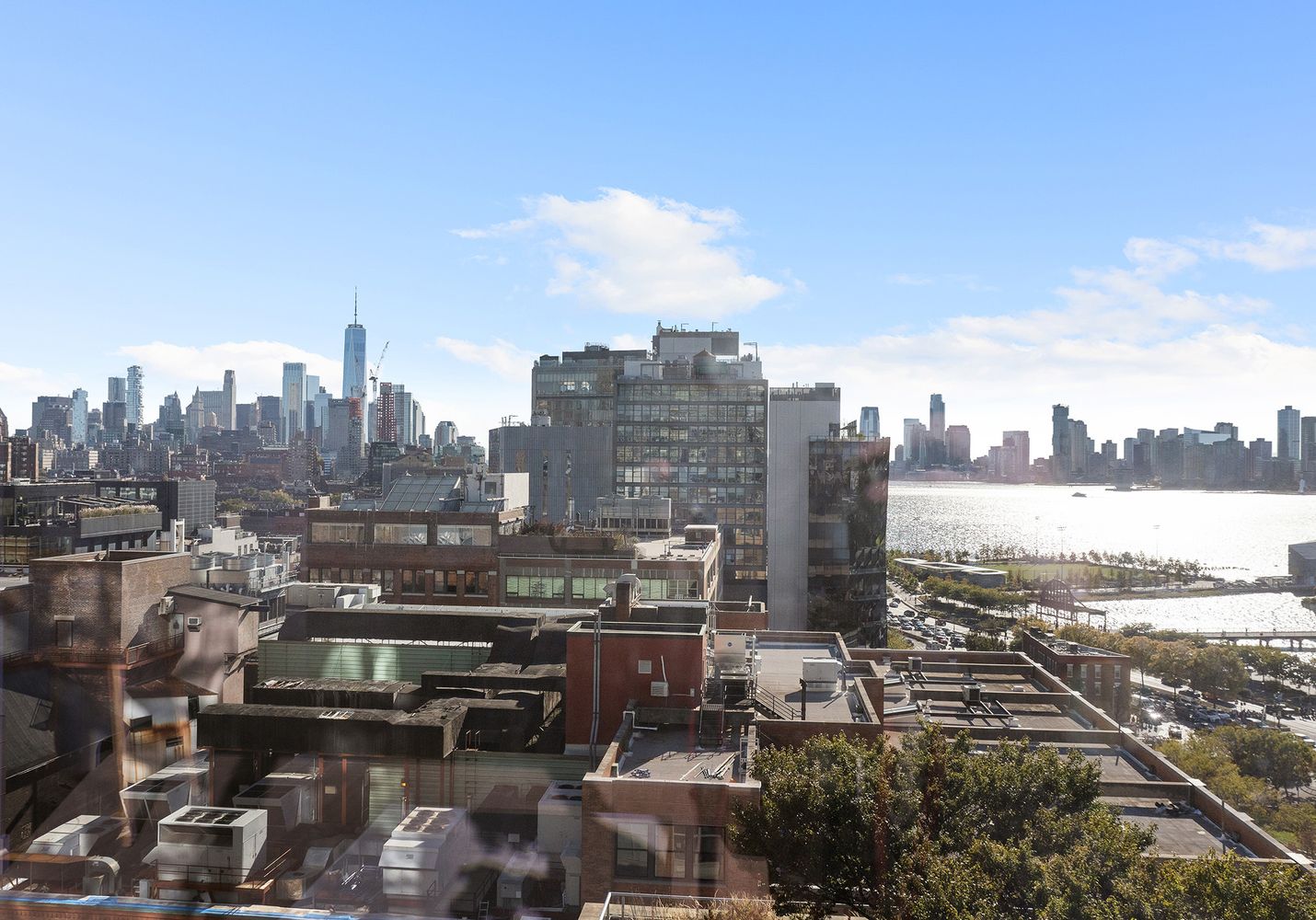 a view of a city with tall buildings