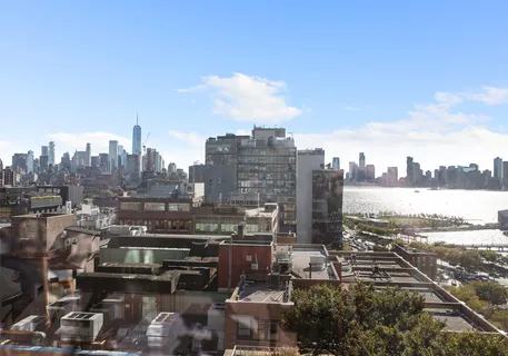 a view of a city with tall buildings