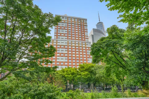 a view of swimming pool from a balcony
