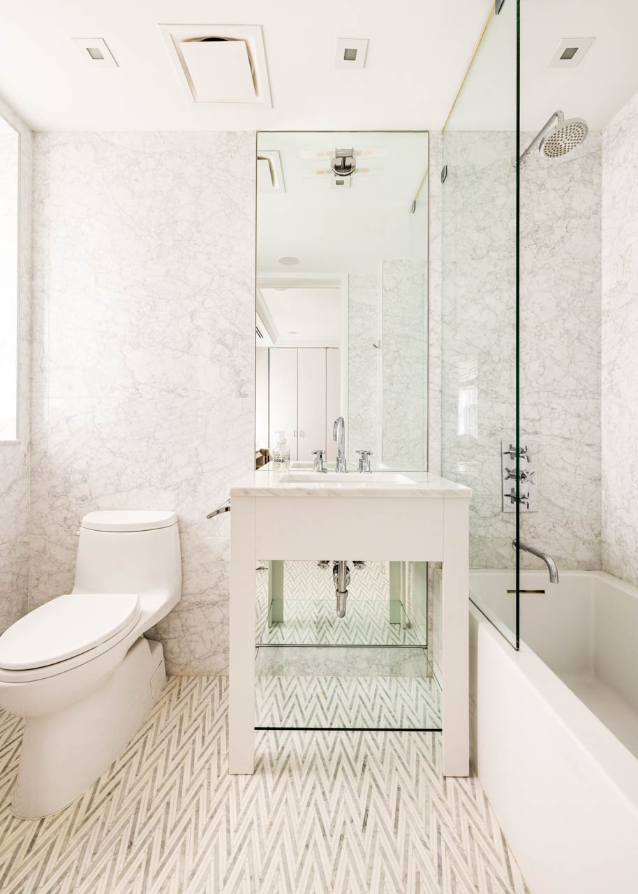 1 Lexington Avenue, Unit 5C Manhattan, NY 10010 - Photo 9 of 12 a bathroom with a sink a toilet and a bathtub