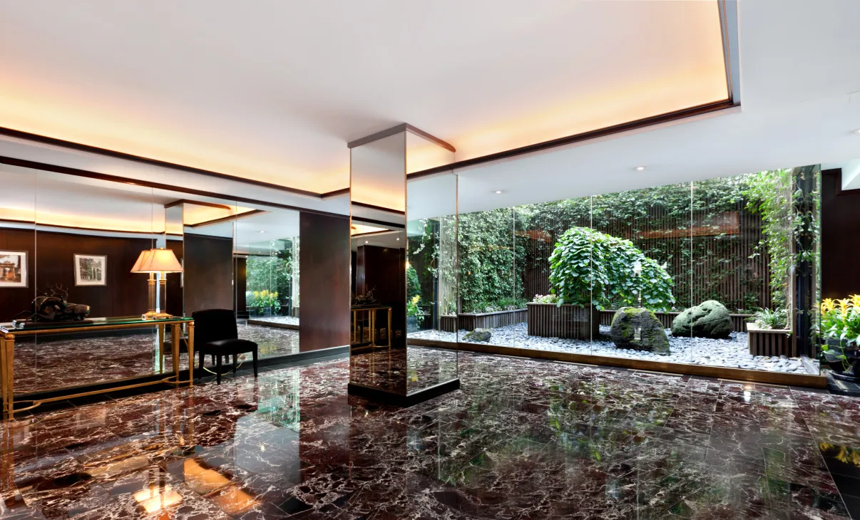 a view of a building with sitting area