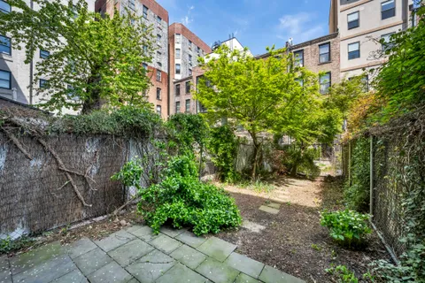 a view of a garden with pathway