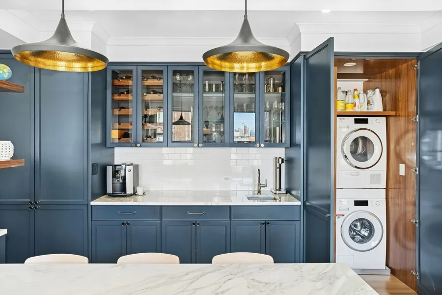 a bathroom with a sink a mirror and shower