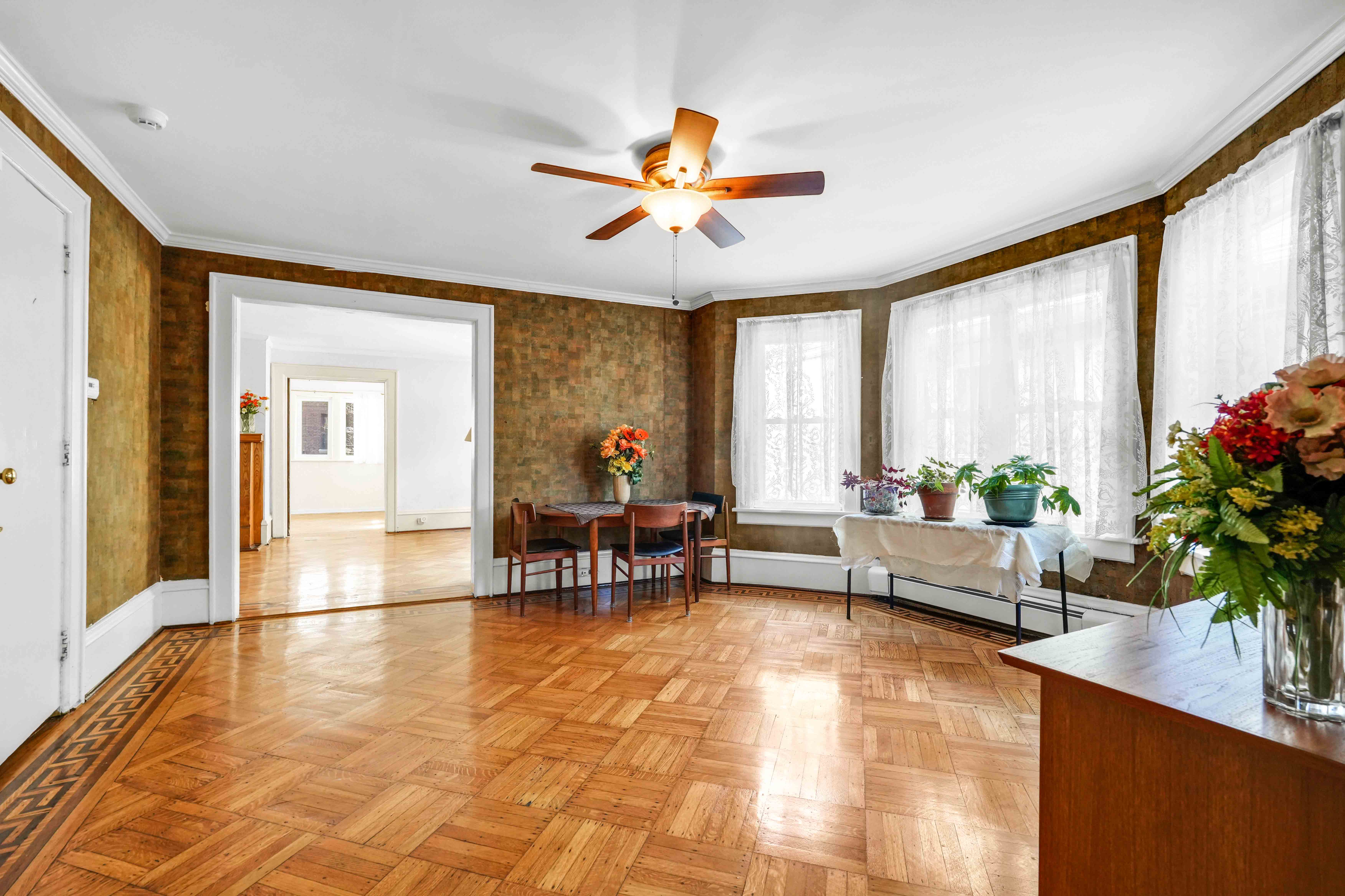 642 East 26th Street Brooklyn, NY 11210 - Photo 9 of 32 a living room with furniture and a large window