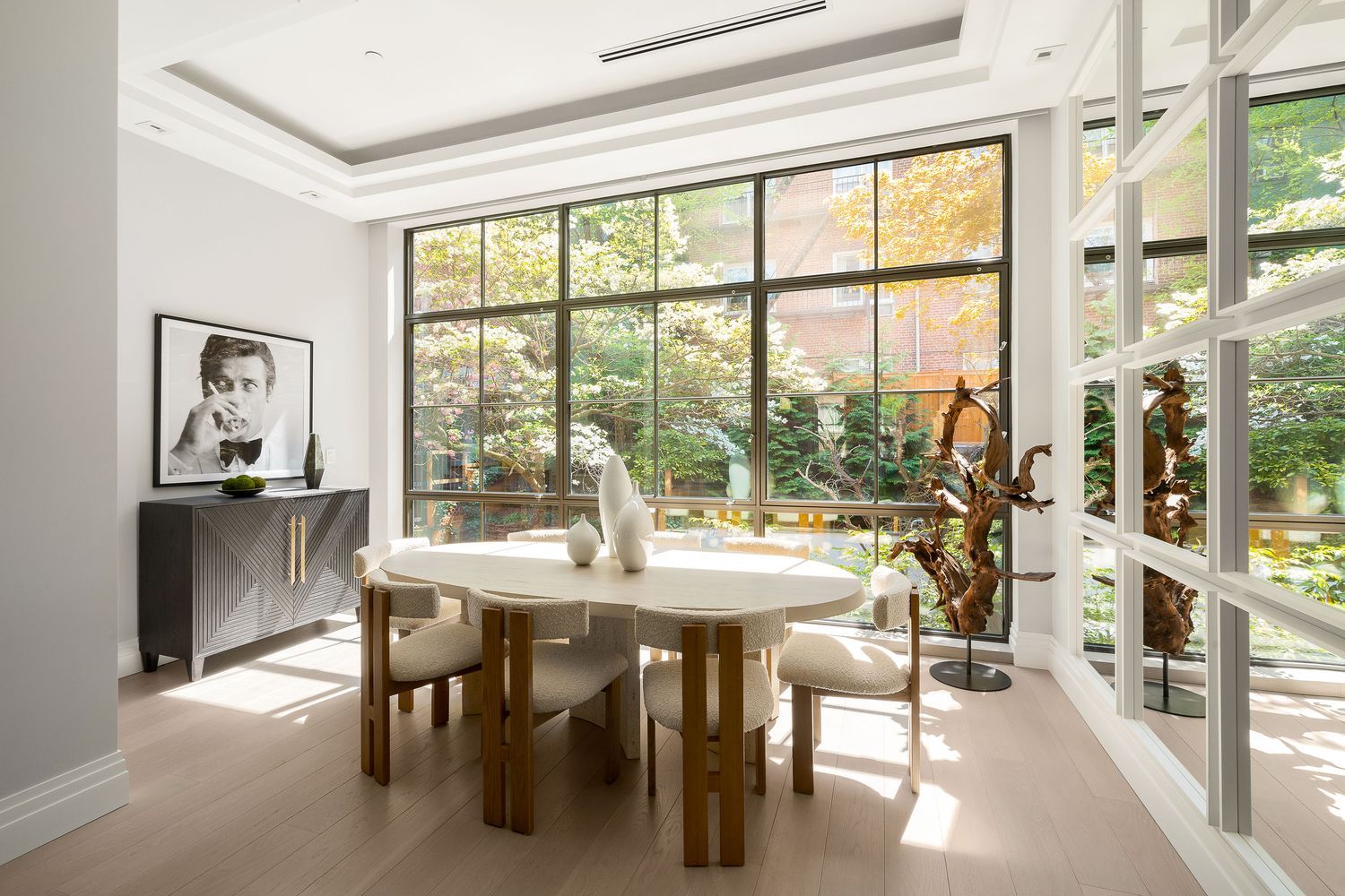 a view of a dining room with furniture window and outside view