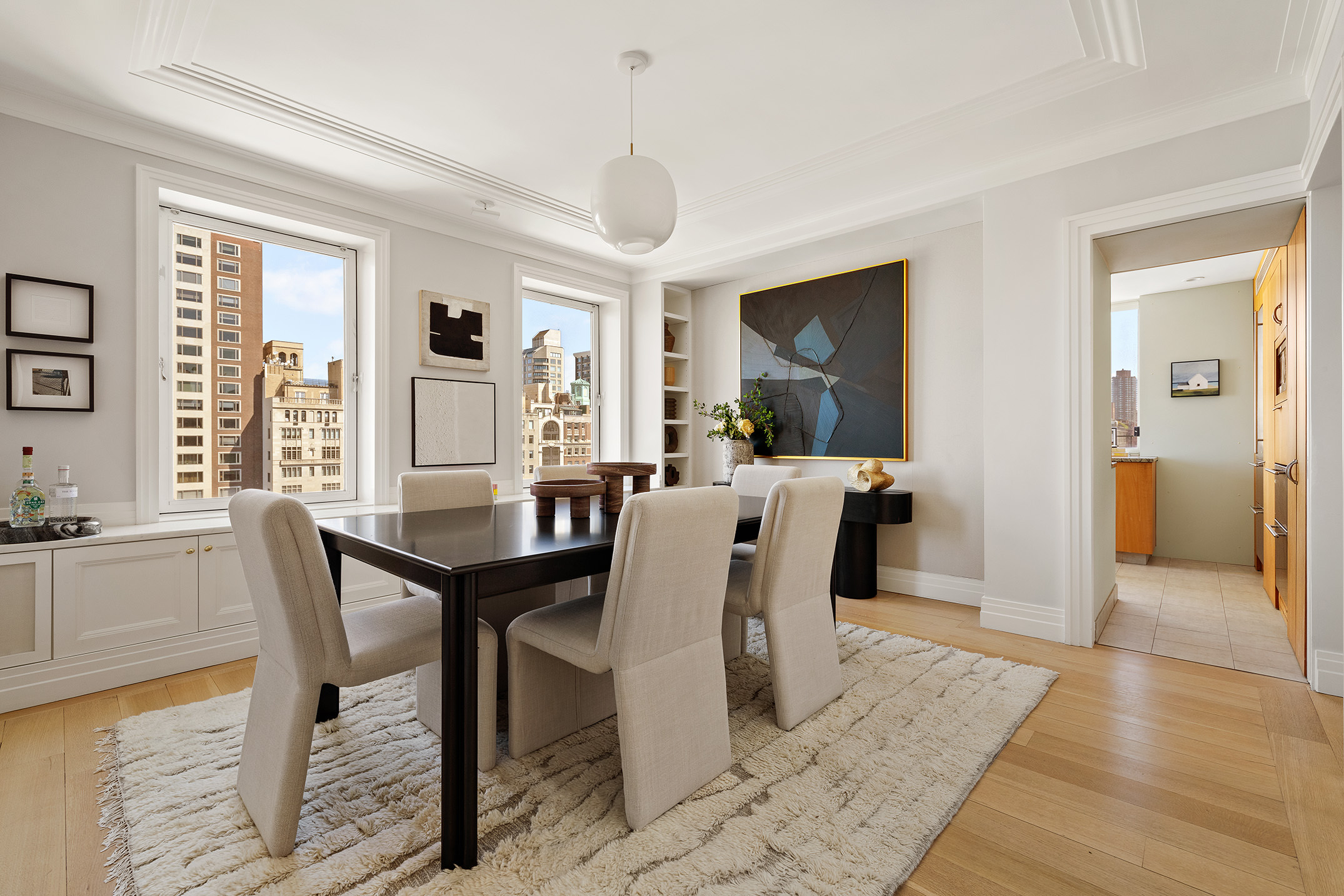 969 5th Avenue, Unit 14 Manhattan, NY 10075 - Photo 6 of 17 a view of a a dining room with furniture window and wooden floor
