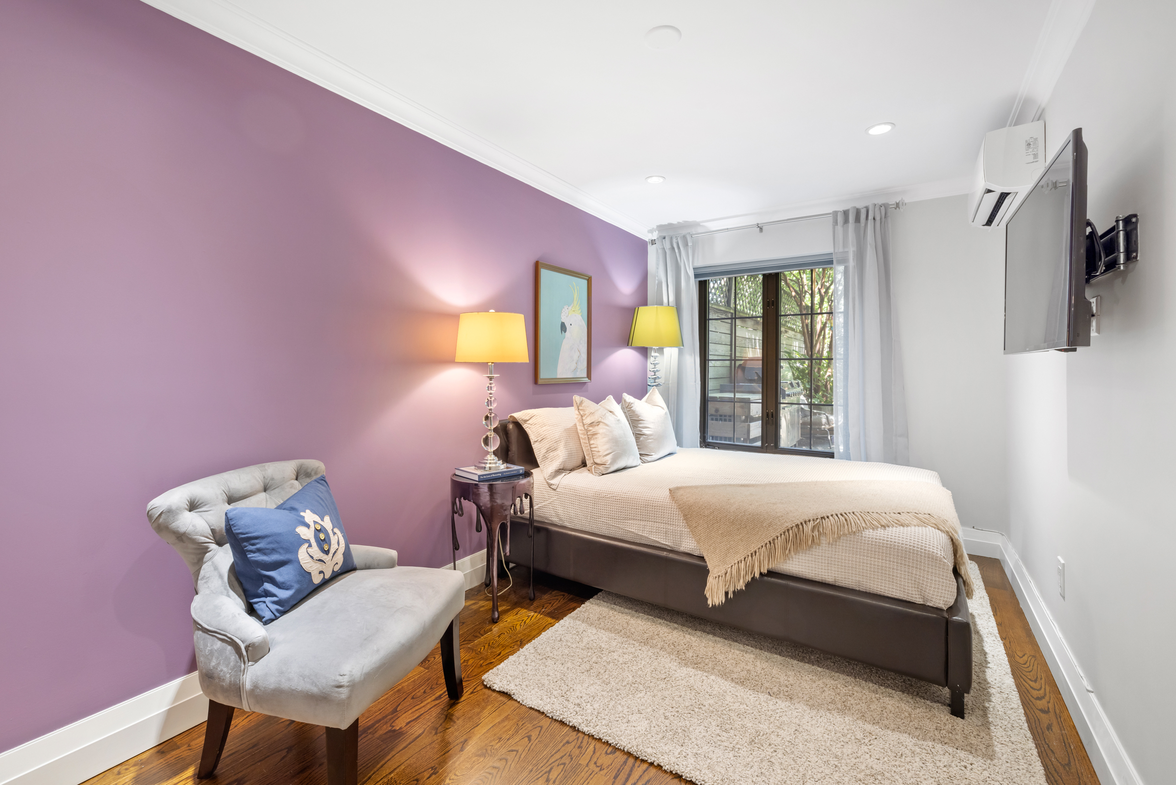 439 A Monroe Street Brooklyn, NY 11221 - Photo 20 of 29 a bedroom with a bed and wooden floor