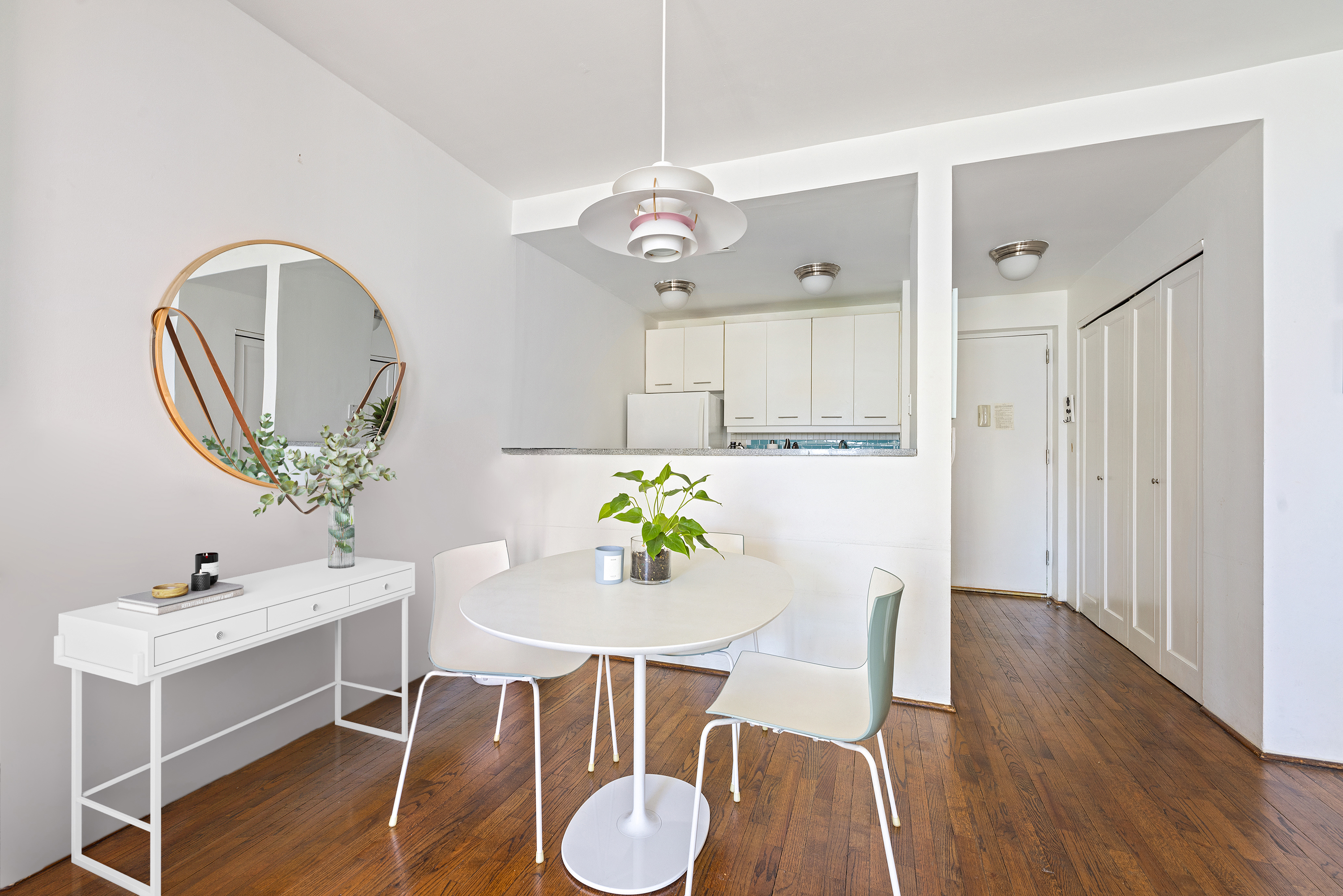 167 Perry Street, Unit 5D Manhattan, NY 10014 - Photo 4 of 18 a view of a dining room with furniture and wooden floor