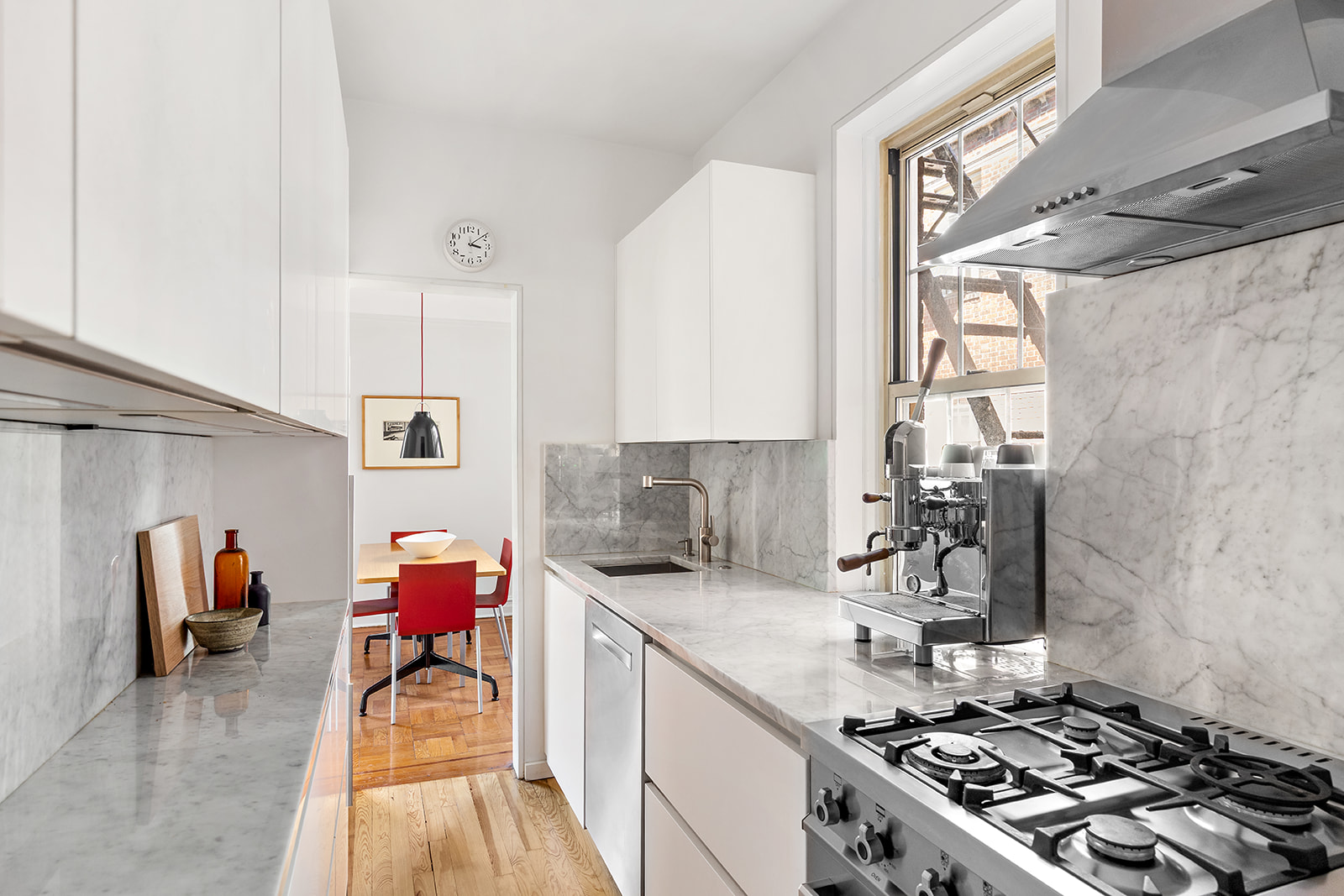 145 Hicks Street, Unit B40 Brooklyn, NY 11201 - Photo 1 of 10 a kitchen with stainless steel appliances granite countertop a sink stove and cabinets