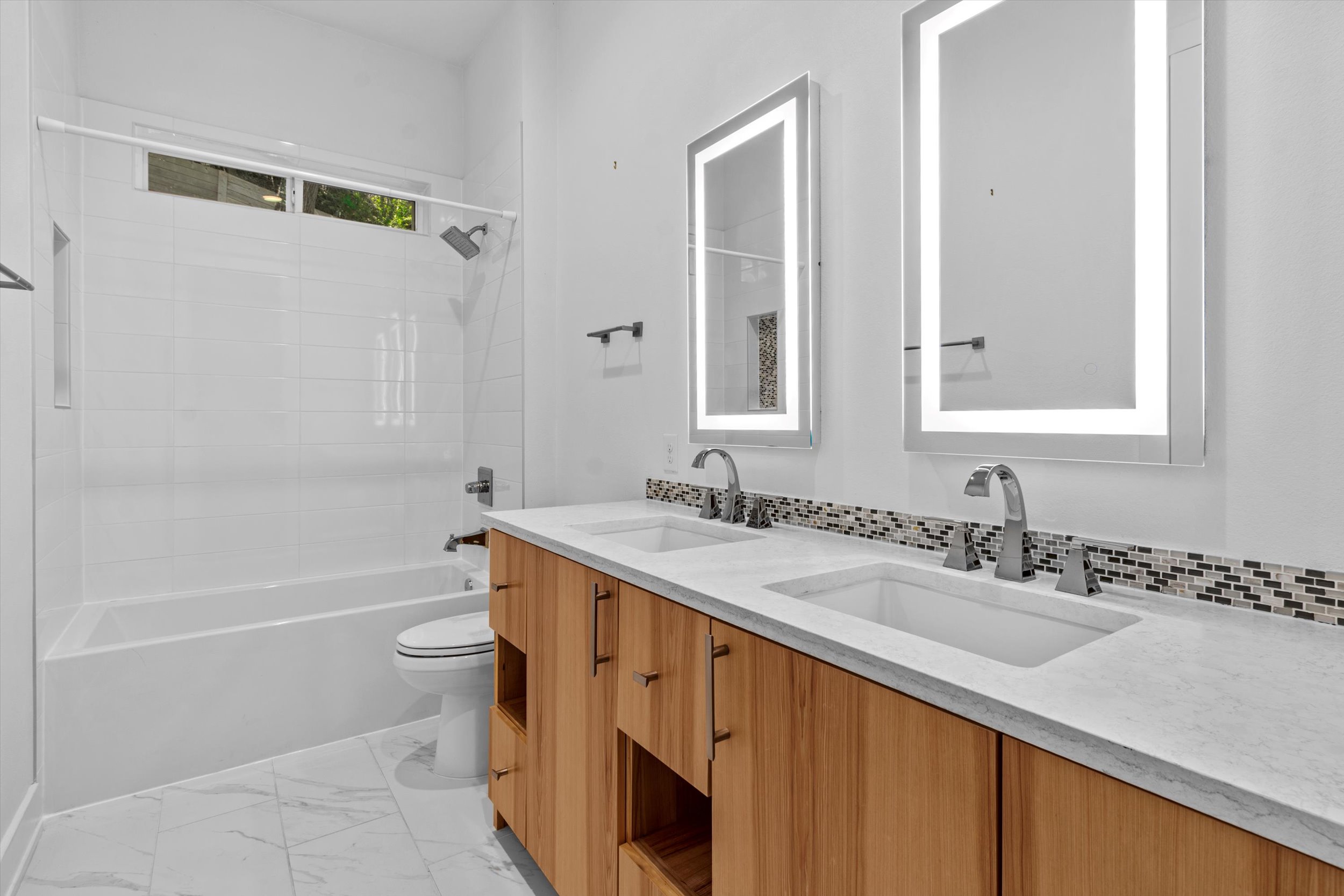 2712 Oak Springs Drive, Unit A Austin, TX 78702 - Photo 20 of 38 a bathroom with a sink a toilet and shower