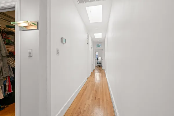 a view of a bathroom from the hallway