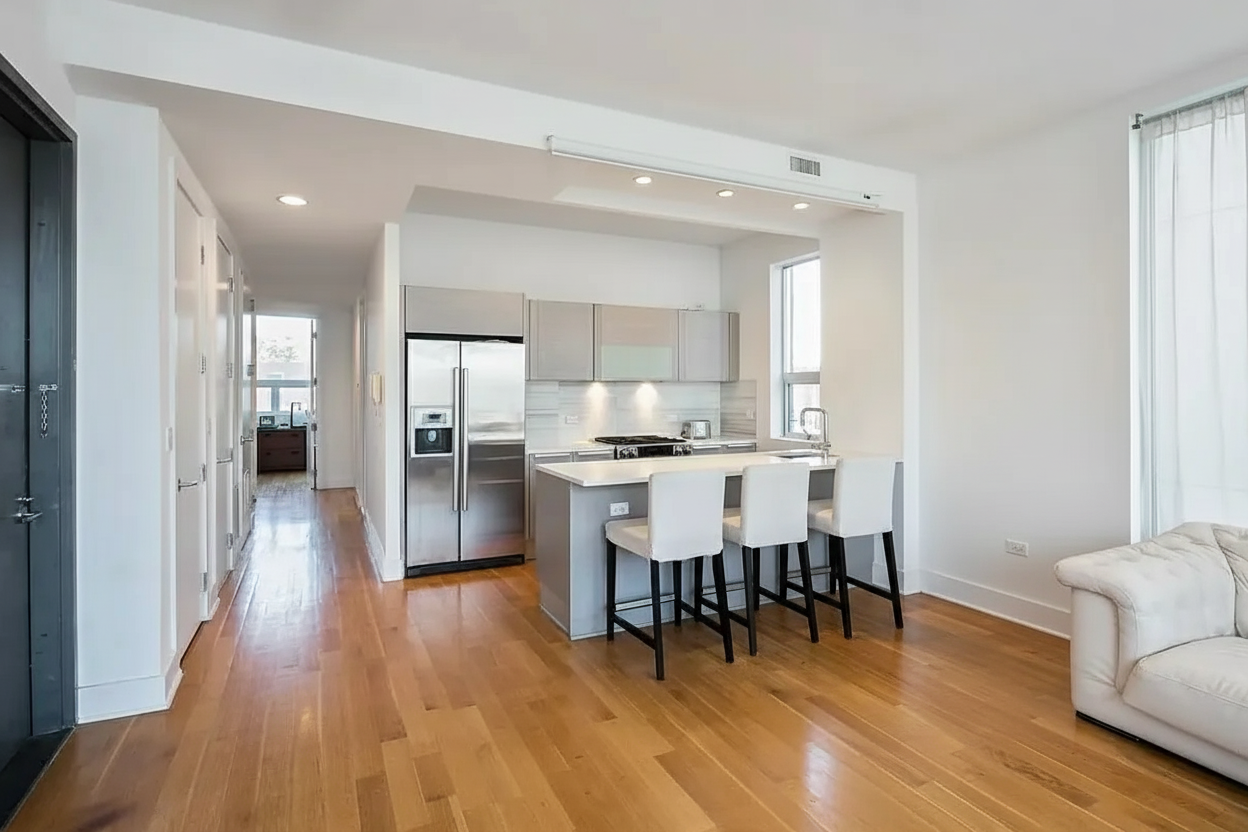 128 Newton Street, Unit 2B Brooklyn, NY 11222 - Photo 2 of 13 a living room with stainless steel appliances furniture and wooden floor