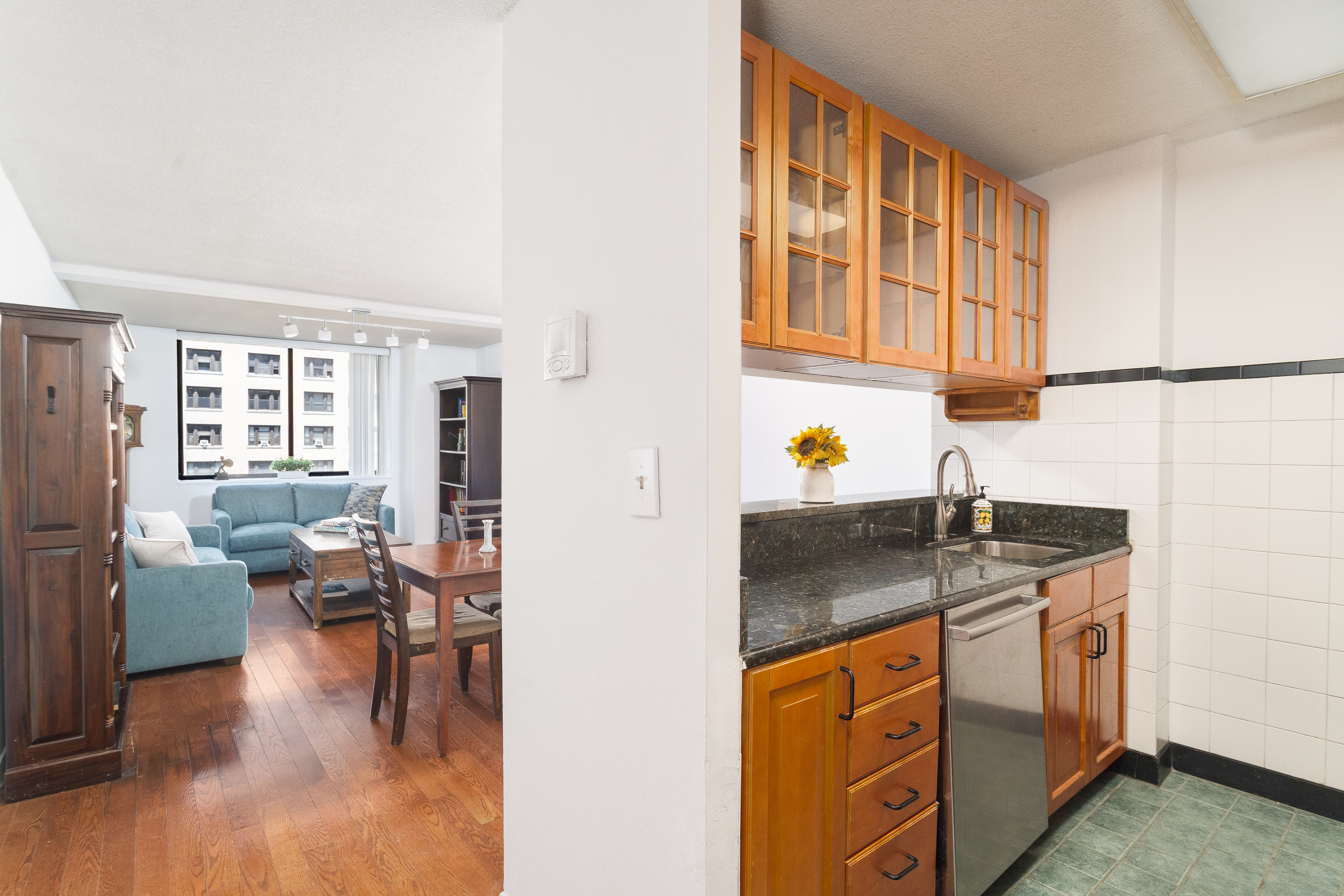 275 West 96th Street, Unit 12B Manhattan, NY 10025 - Photo 7 of 28 a kitchen with stainless steel appliances granite countertop a stove a sink and a refrigerator
