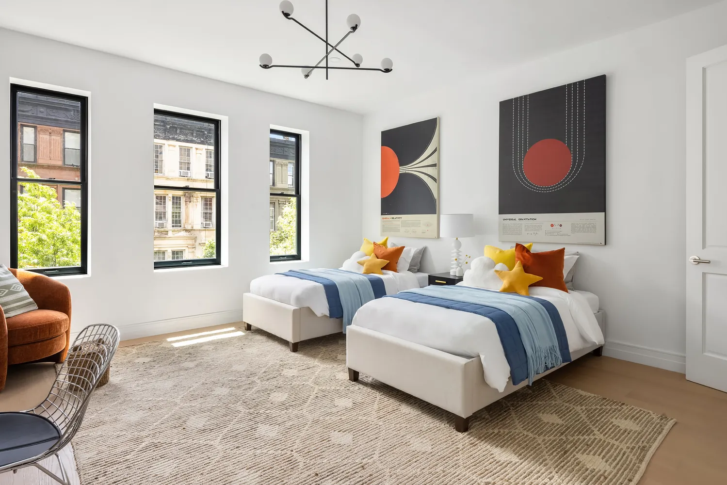 a bedroom with bed couch and window